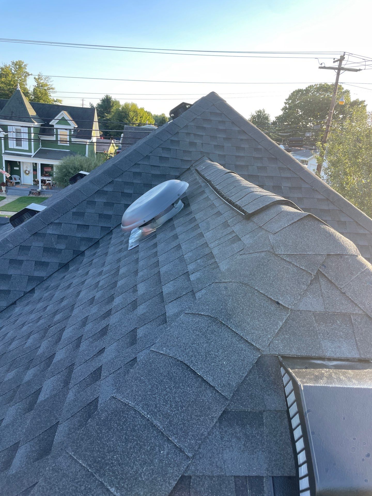 Residential Roofing Installation using GAF Timberline HDZ Charcoal by Rainstoppers Roofing