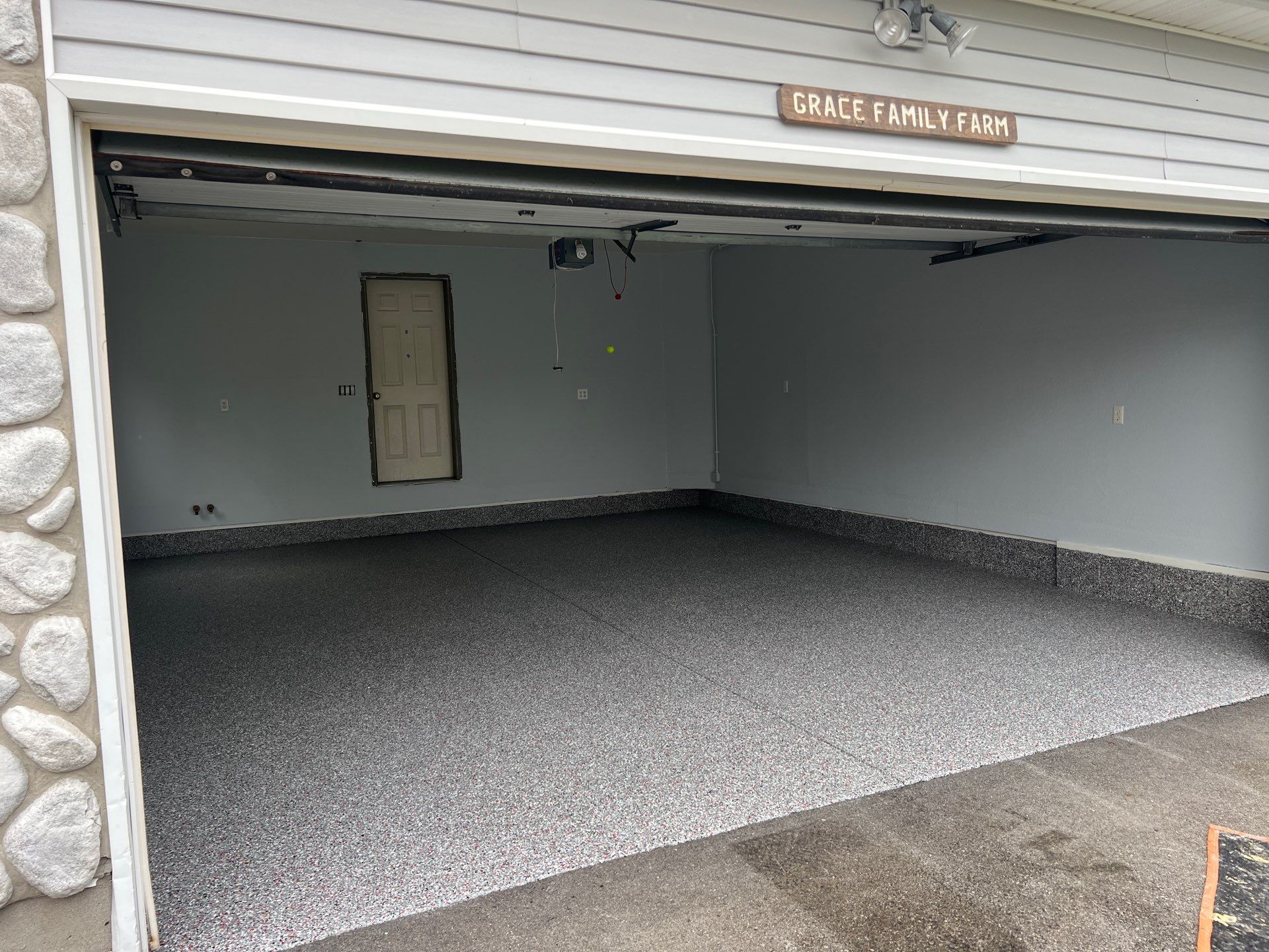 Crimson Storm Garage Coating  by NG Masonry & Construction LLC
