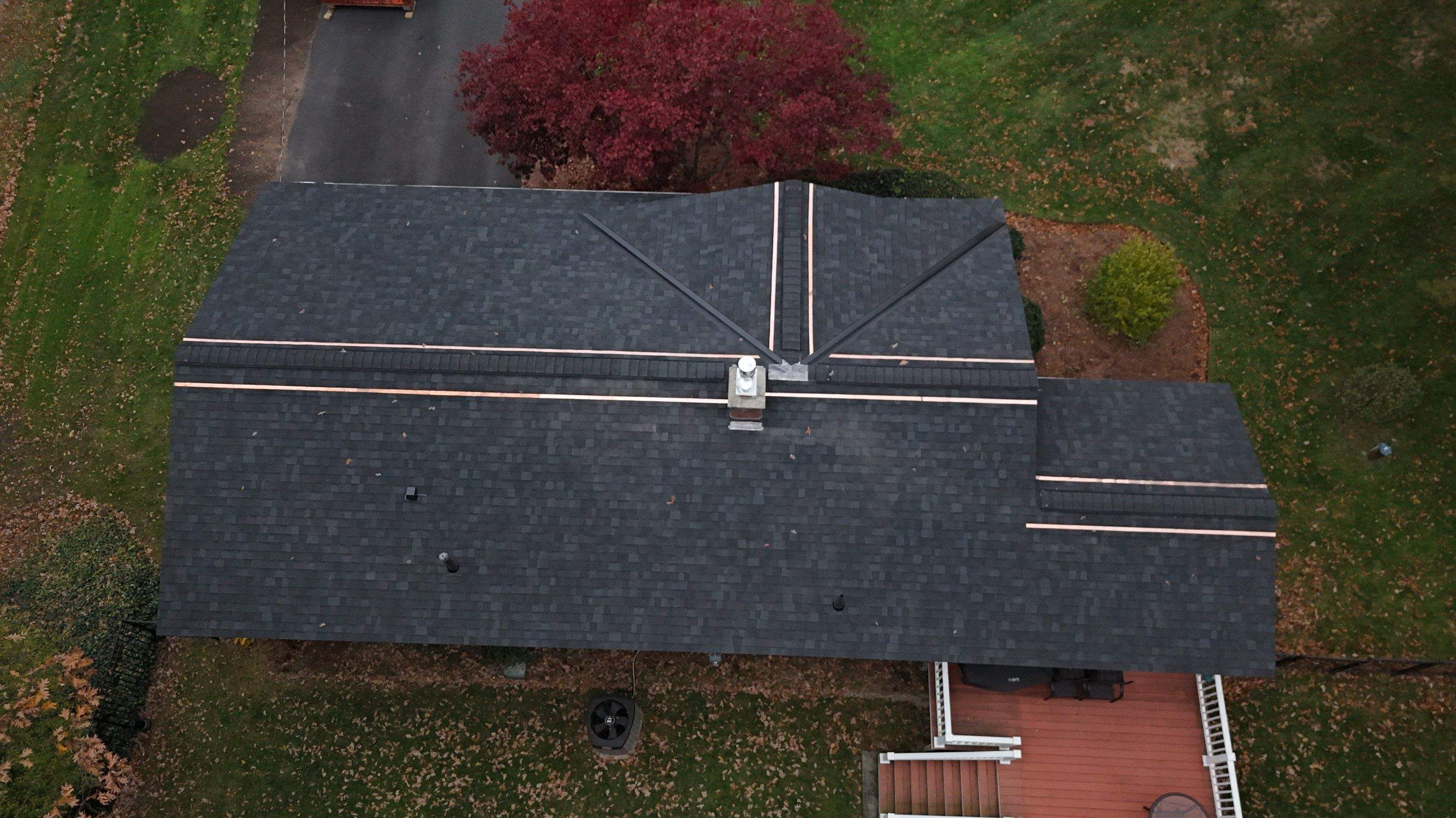 Chelmsford Complete Roof Replacement in Onyx Black with Balanced Ventilation by Mighty Dog Roofing of Greater Middlesex County