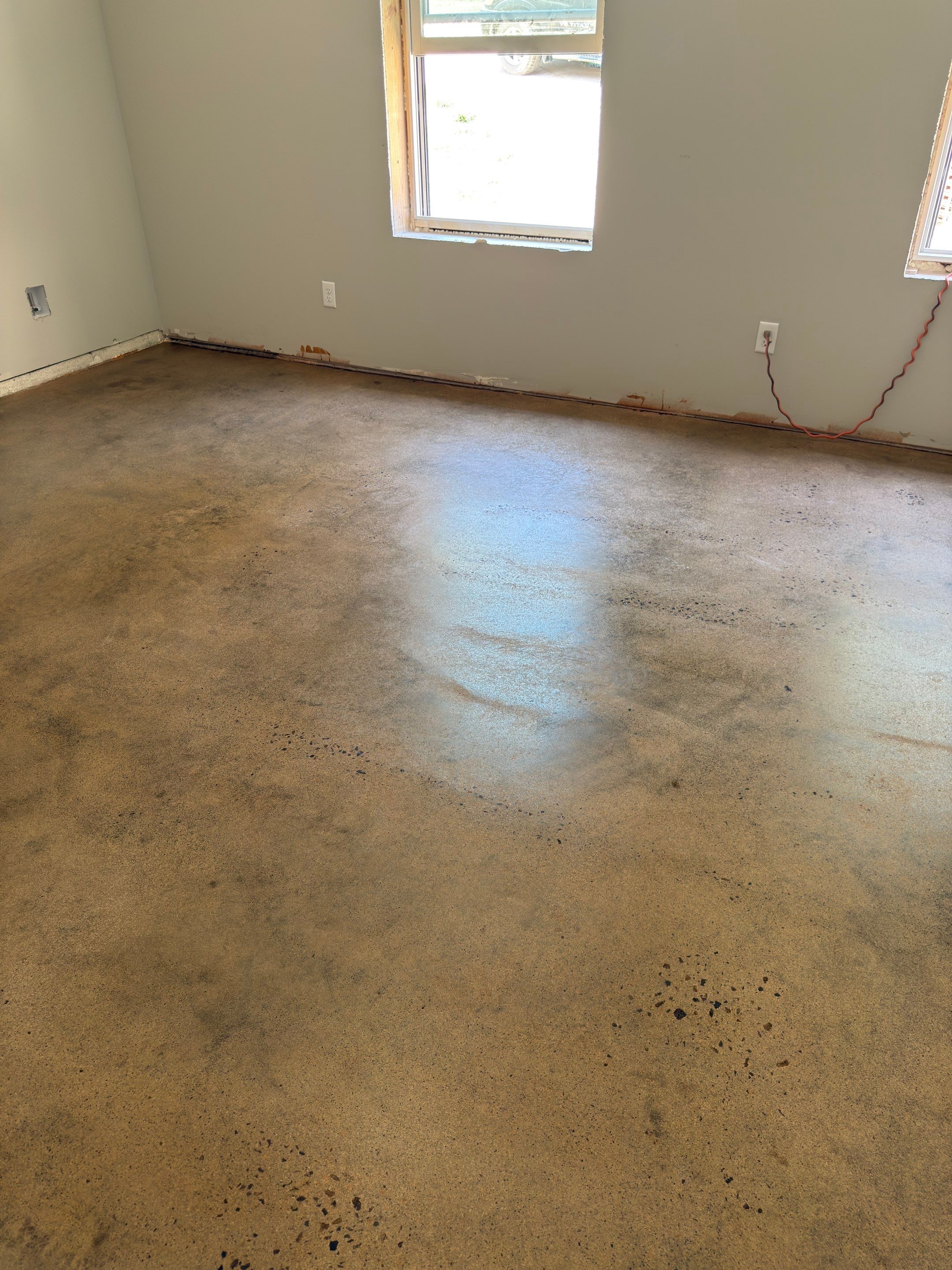 Stained Concrete using Antique Cork by Elite Floor Solutions
