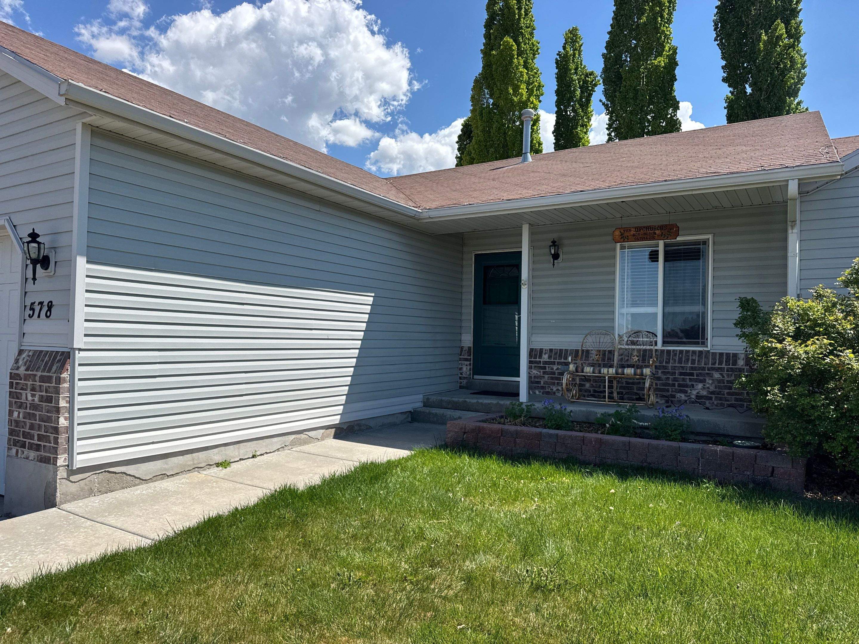Tooele | Targeted Vinyl Repair & Gutter System | Gray by Ideal Siding Utah