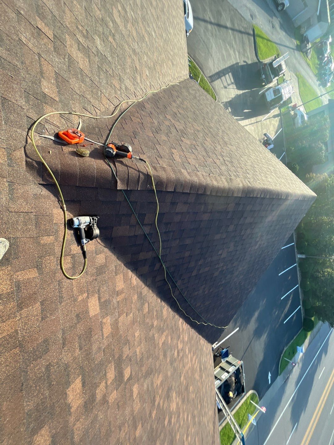 Commercial Roofing Installation using Performance Shingles by Mr. Roofer