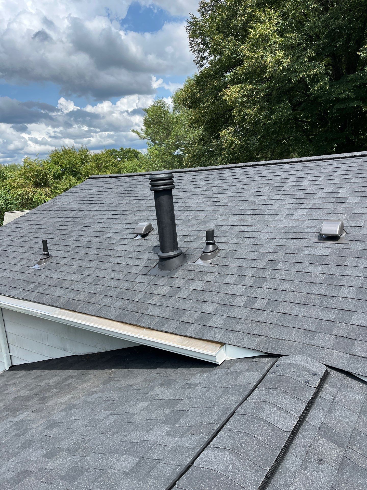 Vienna: Multi-Trade Restoration with CertainTeed Landmark Shingles in Charcoal Black by RM Banning, Inc.