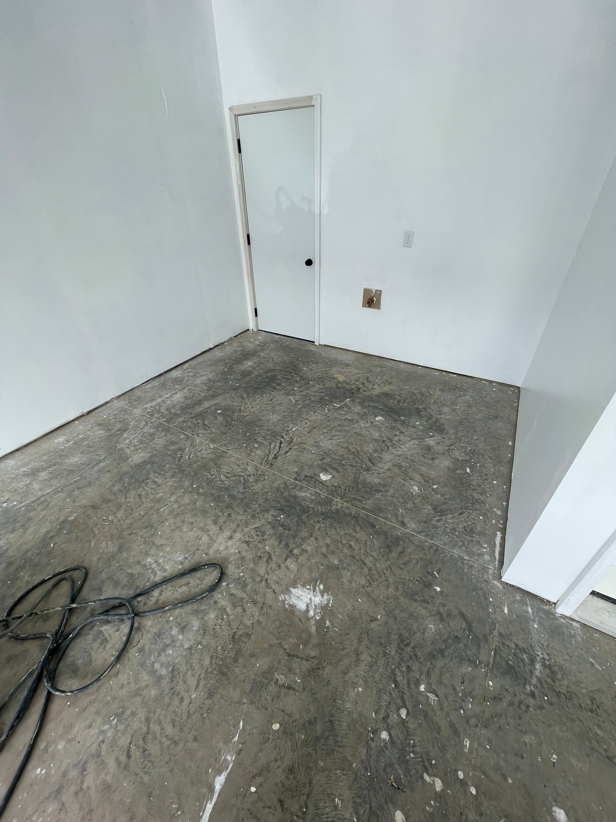 Sioux Falls Garage Floor Transformation with Cabin Fever Decorative Chips by Select Painting, Coatings & Garage Cabinets