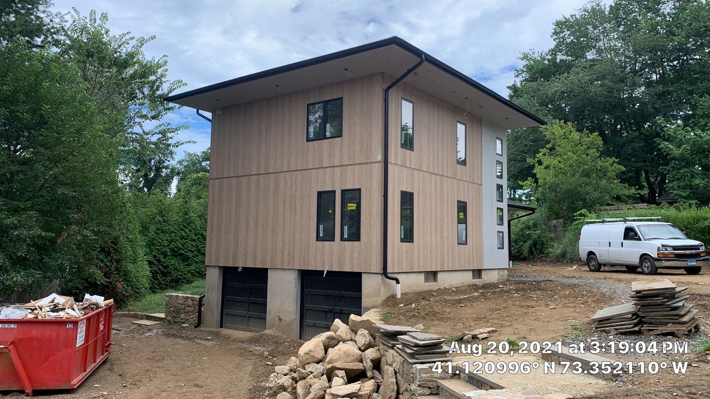 Black Gutters in wesport by A Plus Exterior