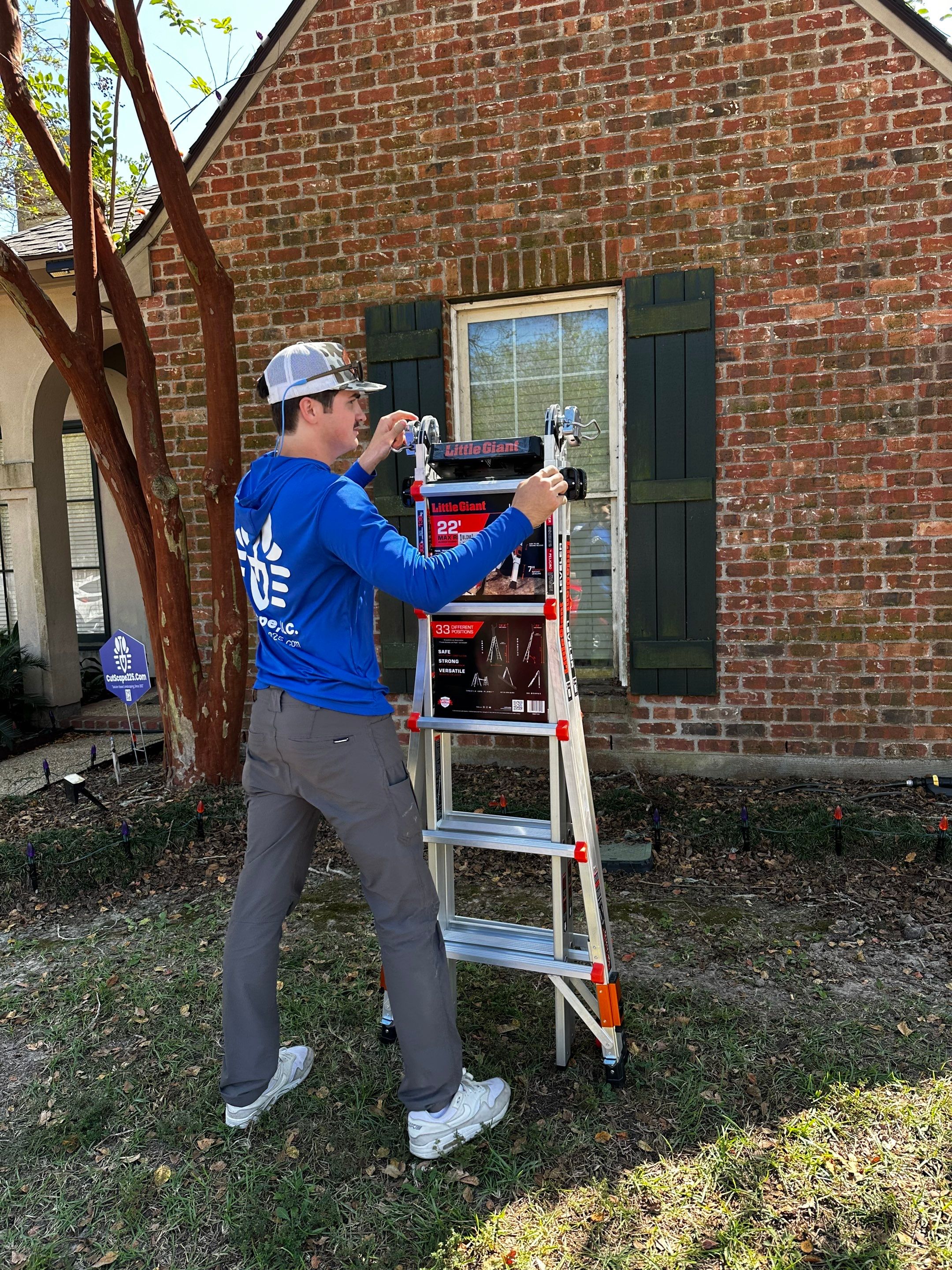 HOLIDAY LIGHTING using ROOFLINE PERIMETER LIGHTING: HALLOWEEN THEME WITH ORANGE AND PURPLE BULBS by CutScape, LLC.