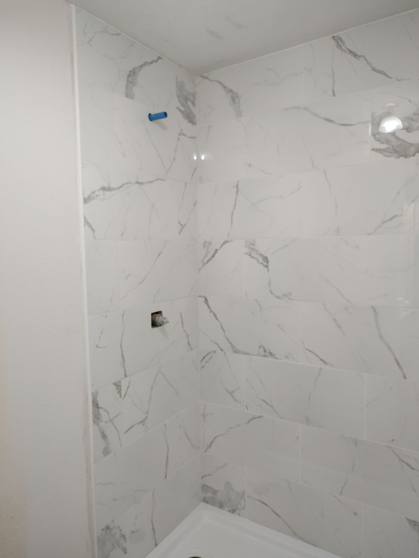 Bathroom remodel w/shower upgrade by In & Out Construction & Remodeling, LLC