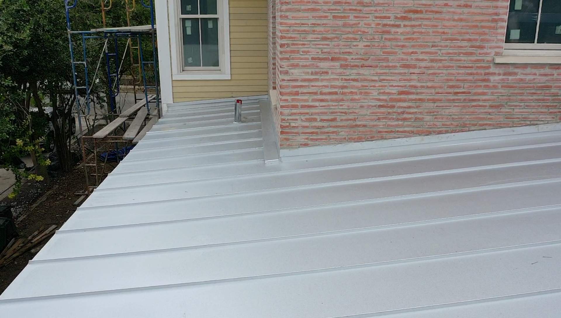 Residential Metal Roof Installation using McElroy Metal by Premier Roofing and Contracting