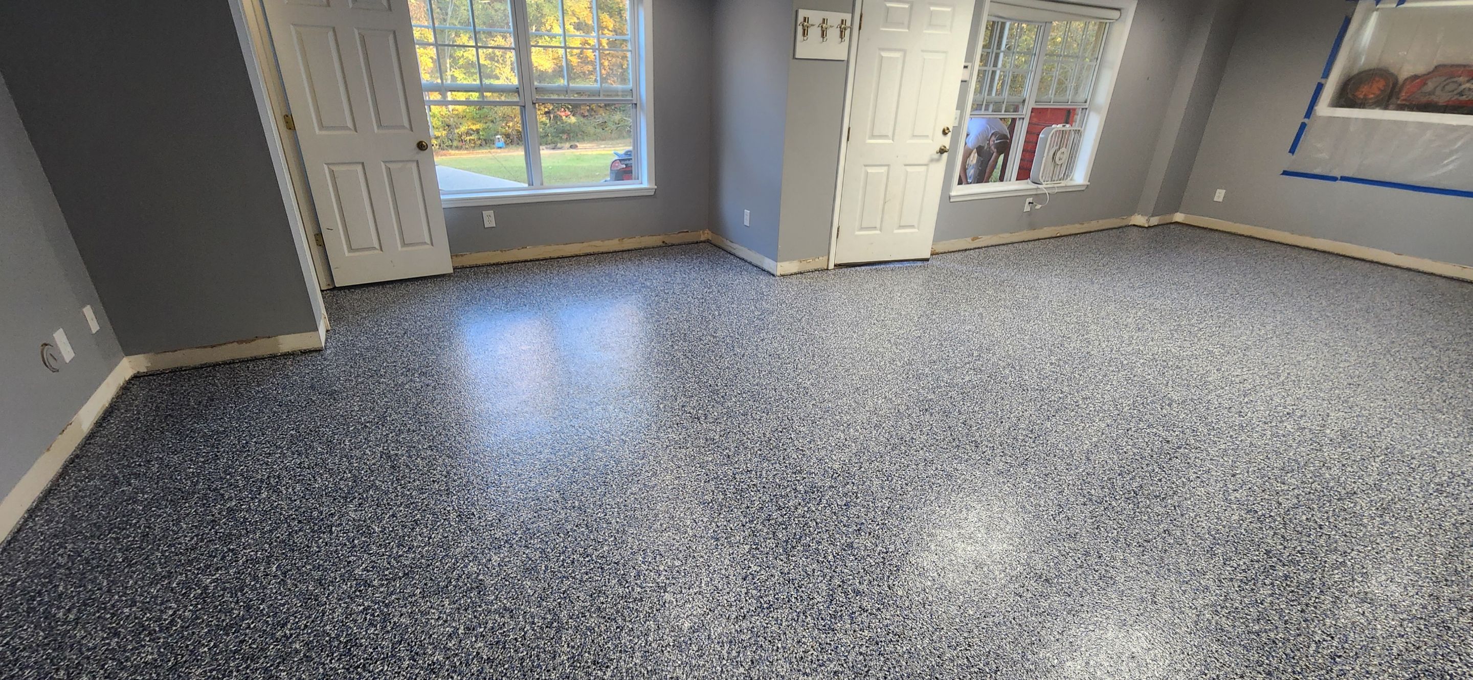 Basement using Denim by Elite Floor Solutions