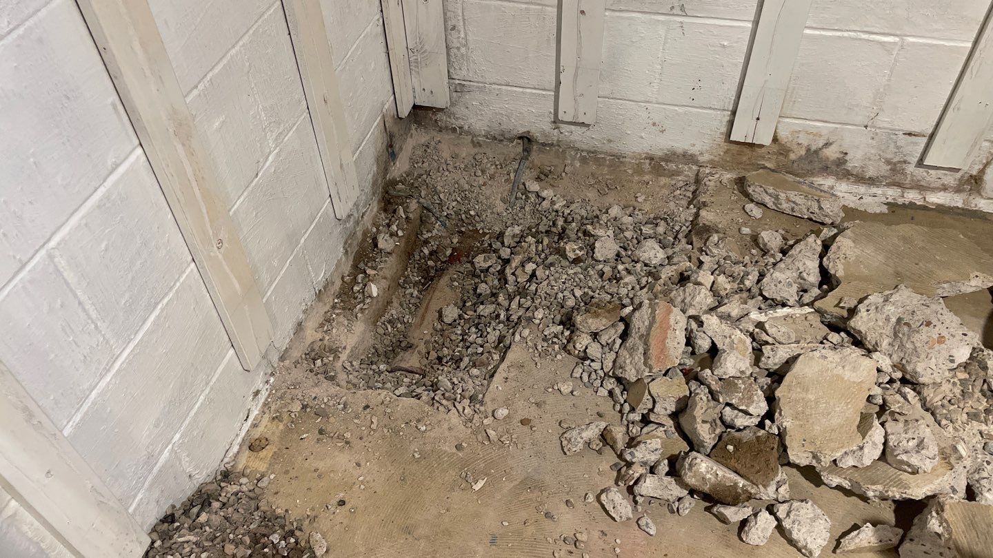 Interior Drain Tile & Buried Discharge in St. Anthony, MN by Waterproofing Northeast
