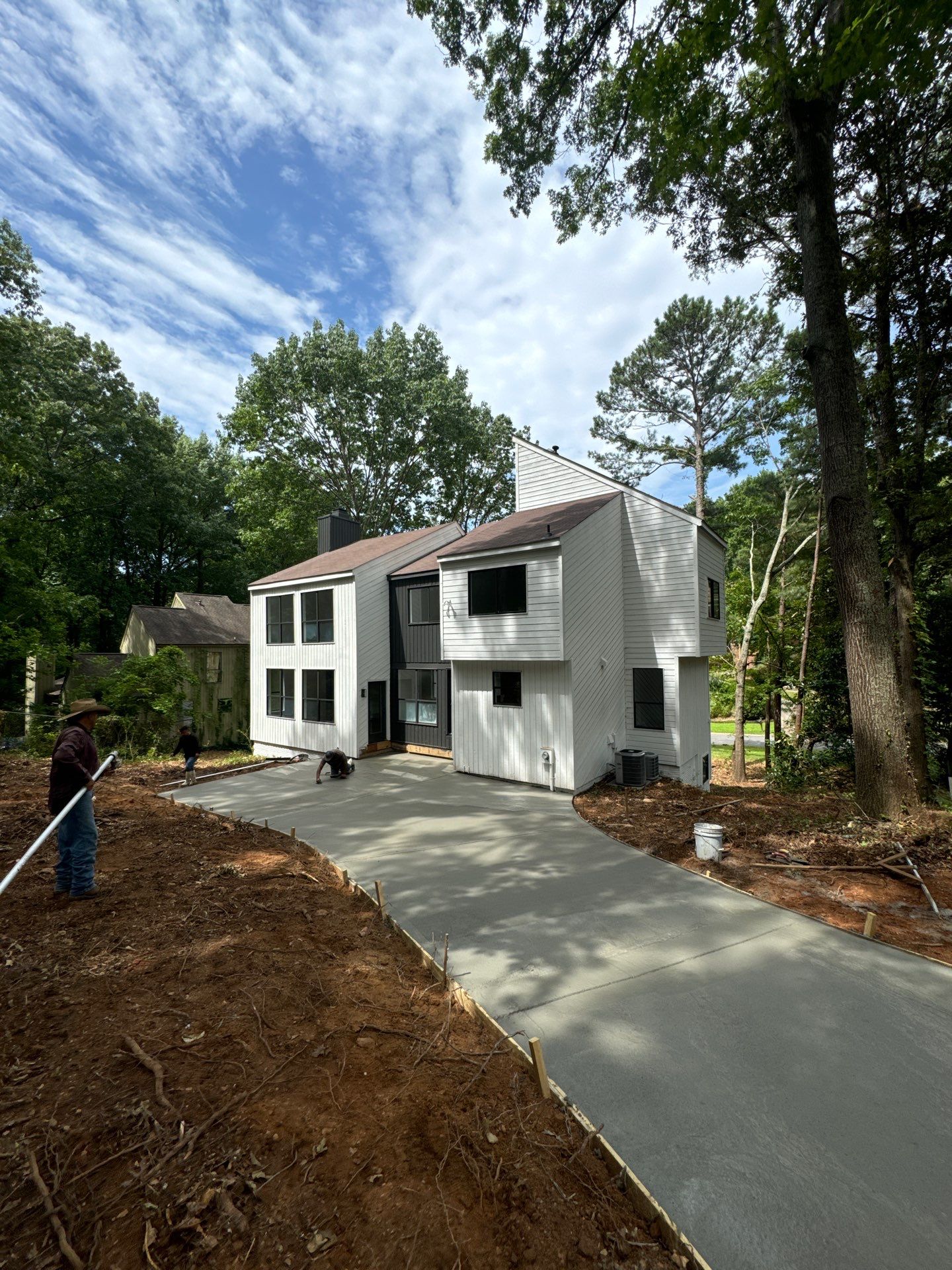 Modern Marietta Home Transformation with Custom Kitchen and Vertical Siding by Swift Home Renovations