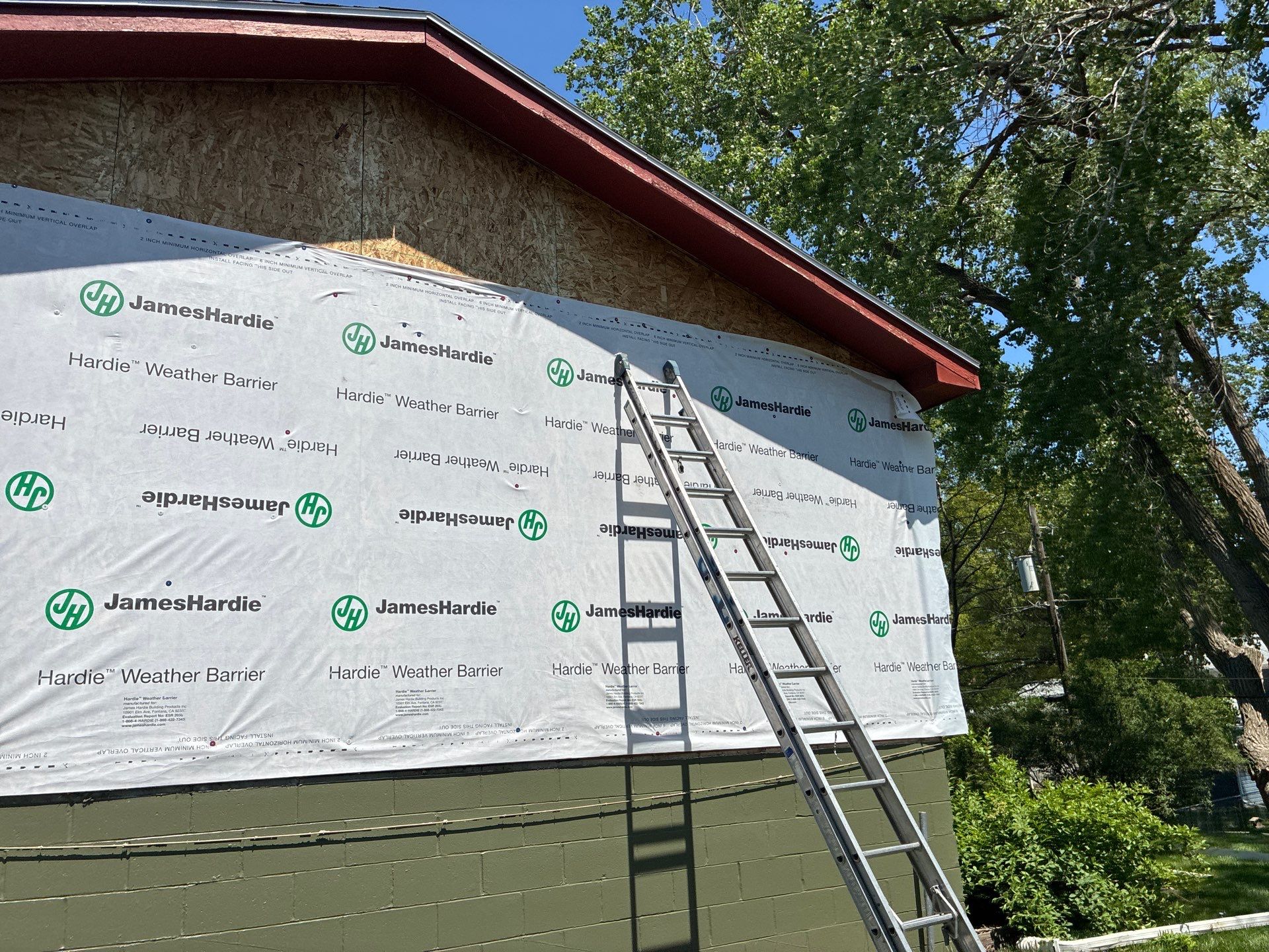 James Hardie Siding Replacement in Omaha with Mountain Sage Finish by Carps Complete Exteriors