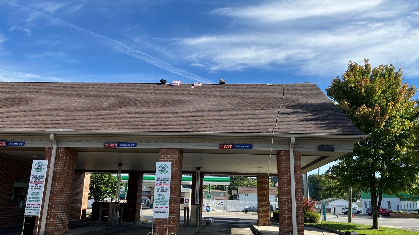 Commercial Roofing Installation using Performance Shingles by Mr. Roofer