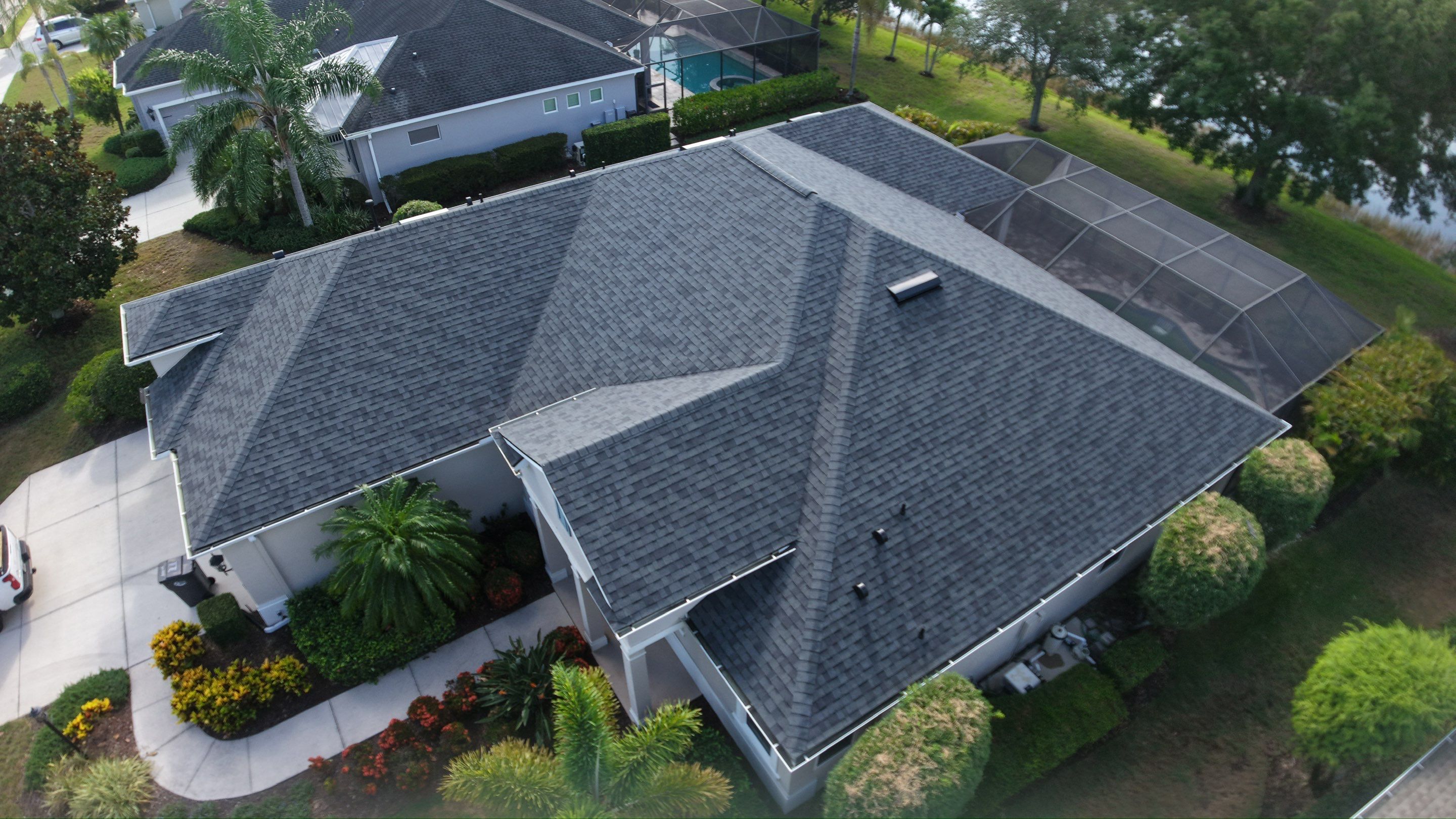 Residential Roof Installation With Estate Grey Architectural Shingles in Bradenton by Trinity Restoration and Roofing LLC