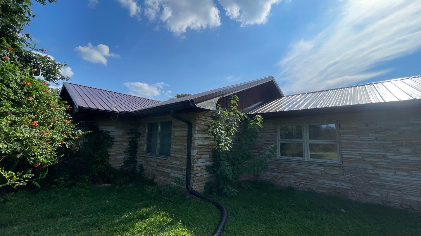 Residential Roofing Install - 29 Gauge G-Rib Metal - Color Brown & Crimson Red by Titan Commercial & Residential Roofing