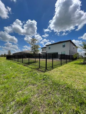 Aluminum Fence Installation using Black 3 Rail Aluminum Fence