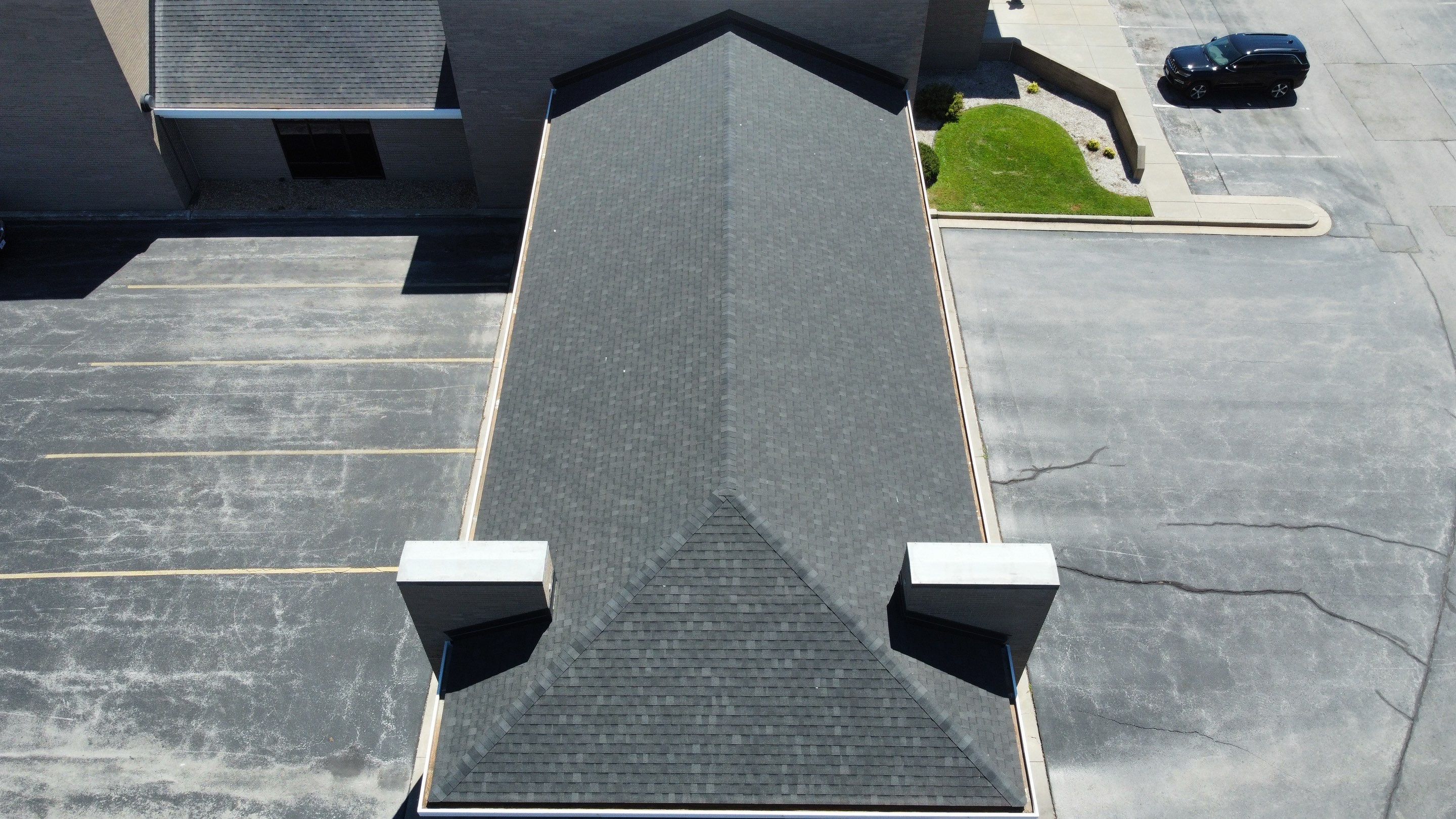 Commercial Shingle Roofing Install - Atlas StormMaster Shake - Color Black Shadow  by Titan Commercial & Residential Roofing 