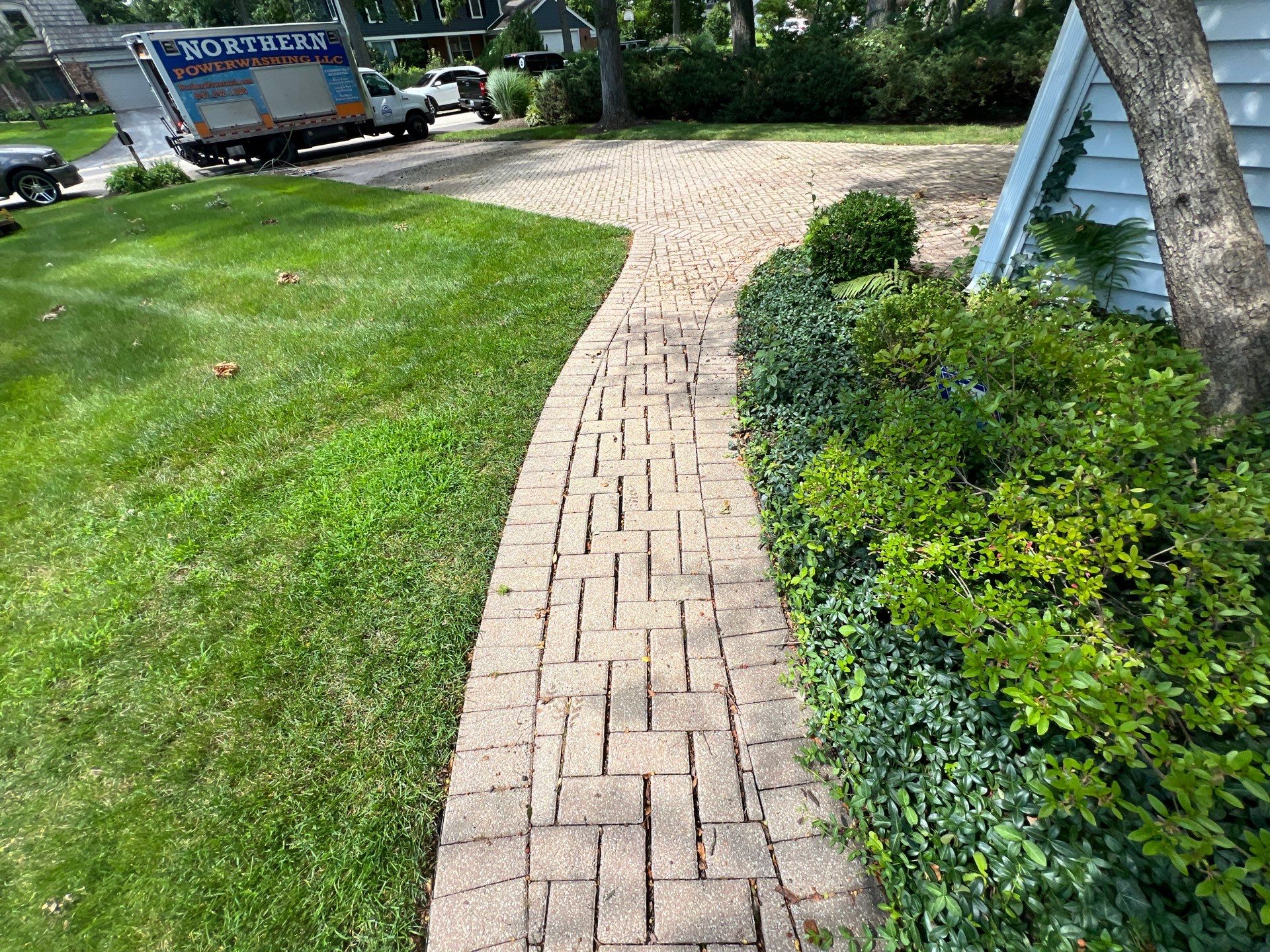Brick paver clean, sand and seal.  using Polysweep polymeric sand by Northern Power Washing LLC.