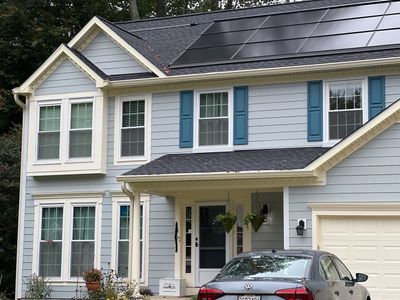 Exterior Home Makeover using GAF Timberline HDZ, GAF Decotech, and James Hardie Siding