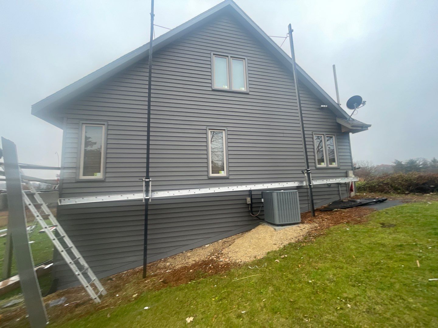 Siding Installation using Norandex Polar Wall Plus Siding, Window Wraps by Total Exteriors