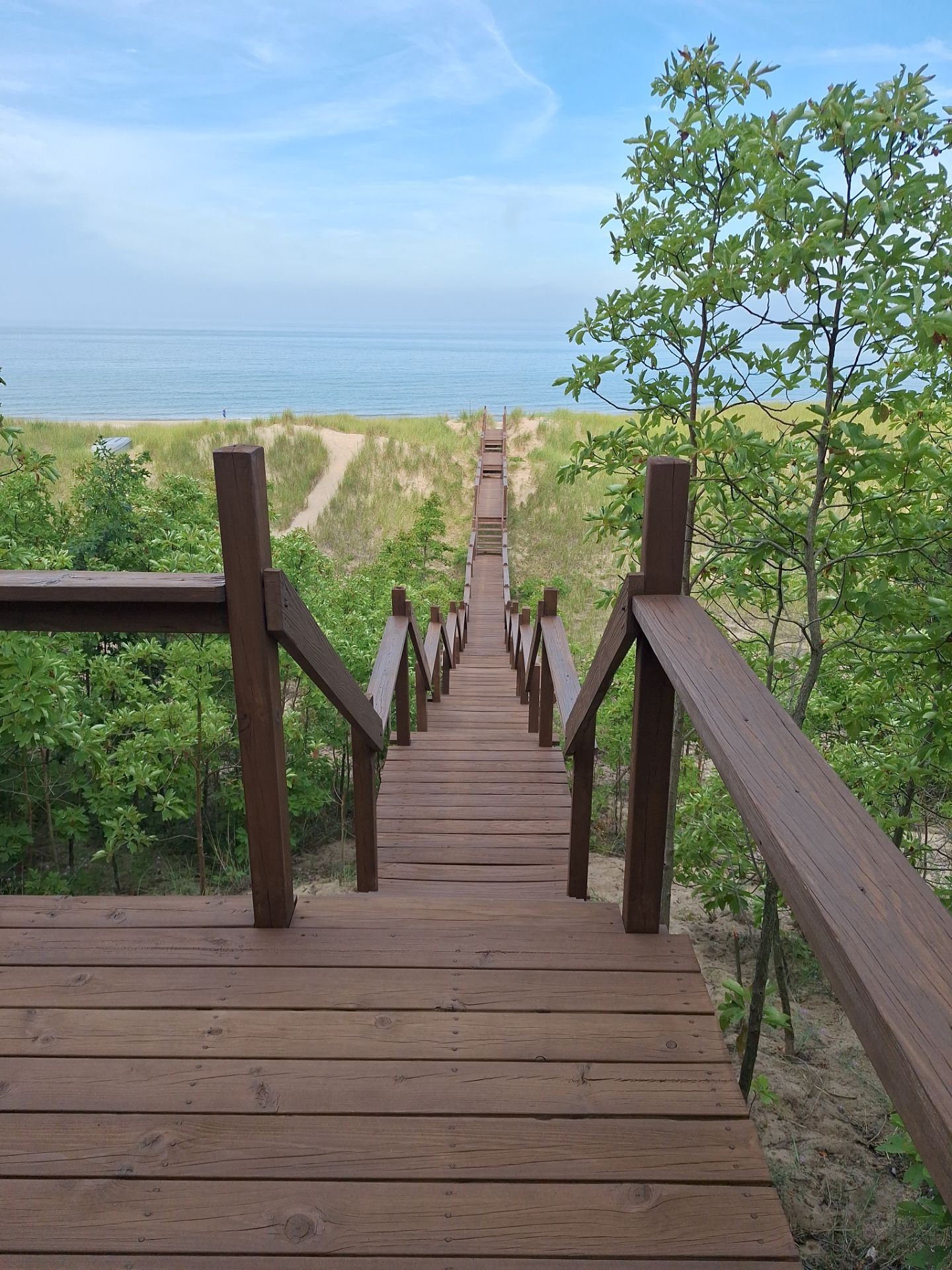 Lakefront Deck Pressure Washing, Exterior Wood Staining, and Painting in West Olive MI by Gordon Painting