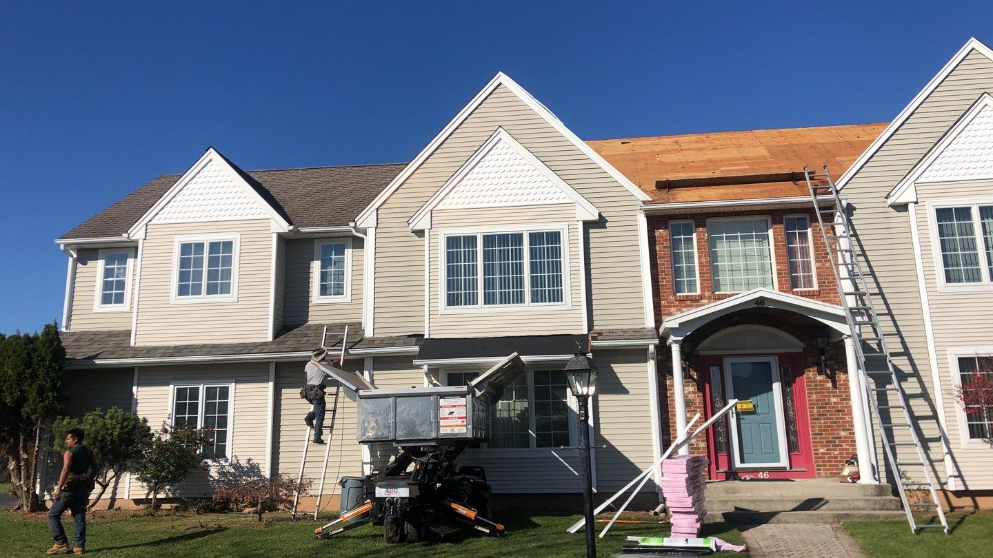 Commercial Roofing Installation using Owens Corning TruDefinition driftwood by A Plus Exterior