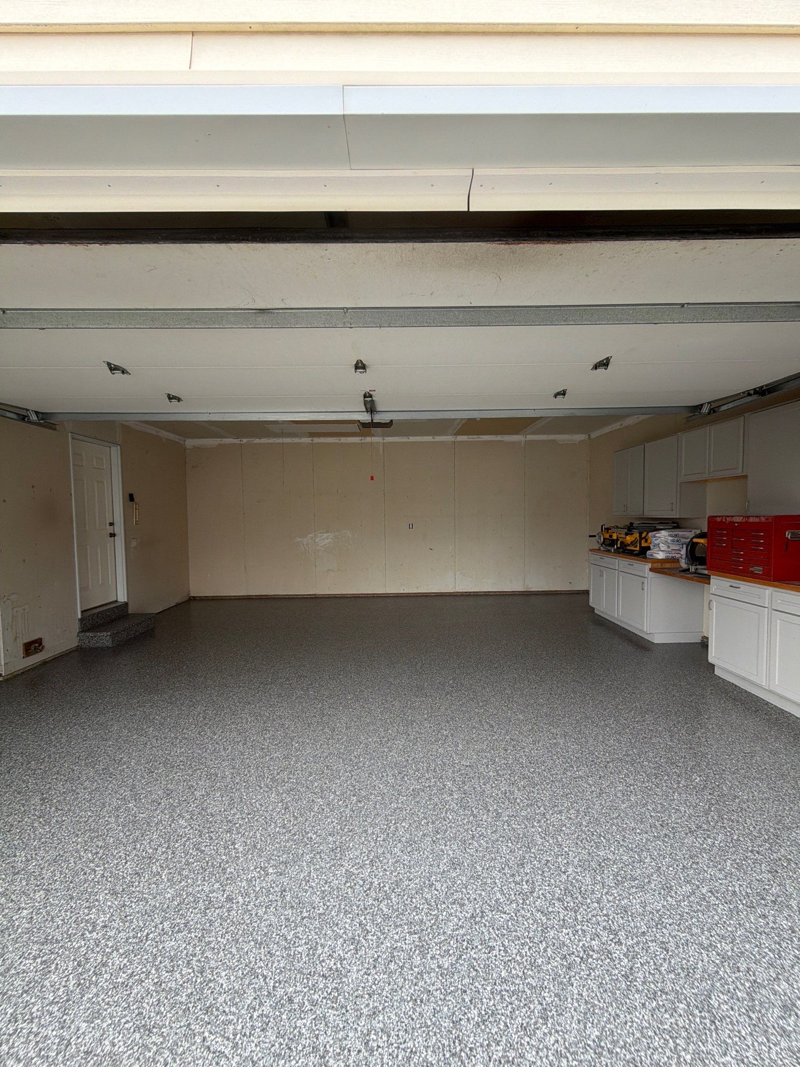 Ames Garage Floor Coating - Epoxy Replacement by Revival Concrete Coatings