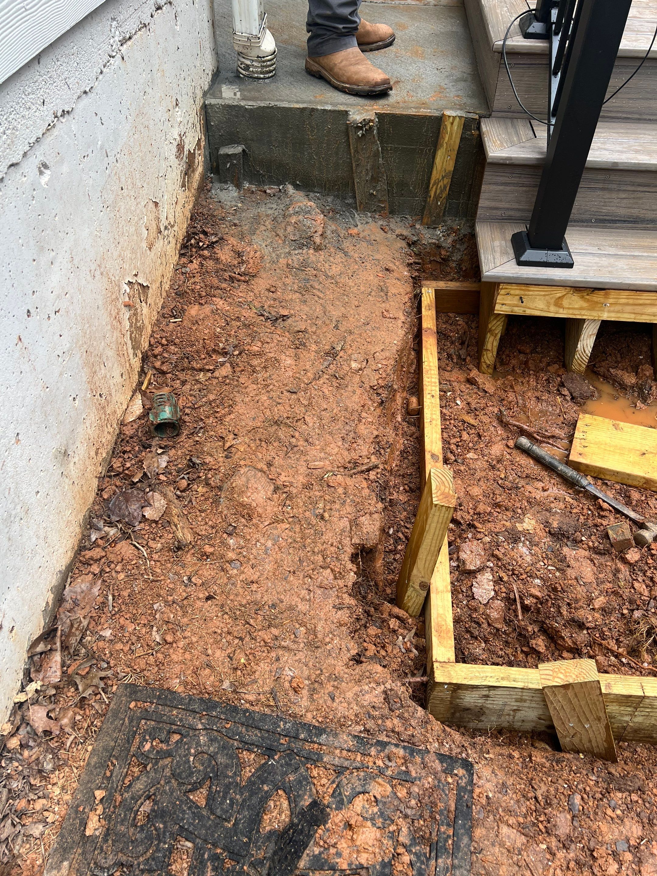 Elevated Composite Deck and Concrete Landing Installation in Kennesaw by Swift Home Renovations