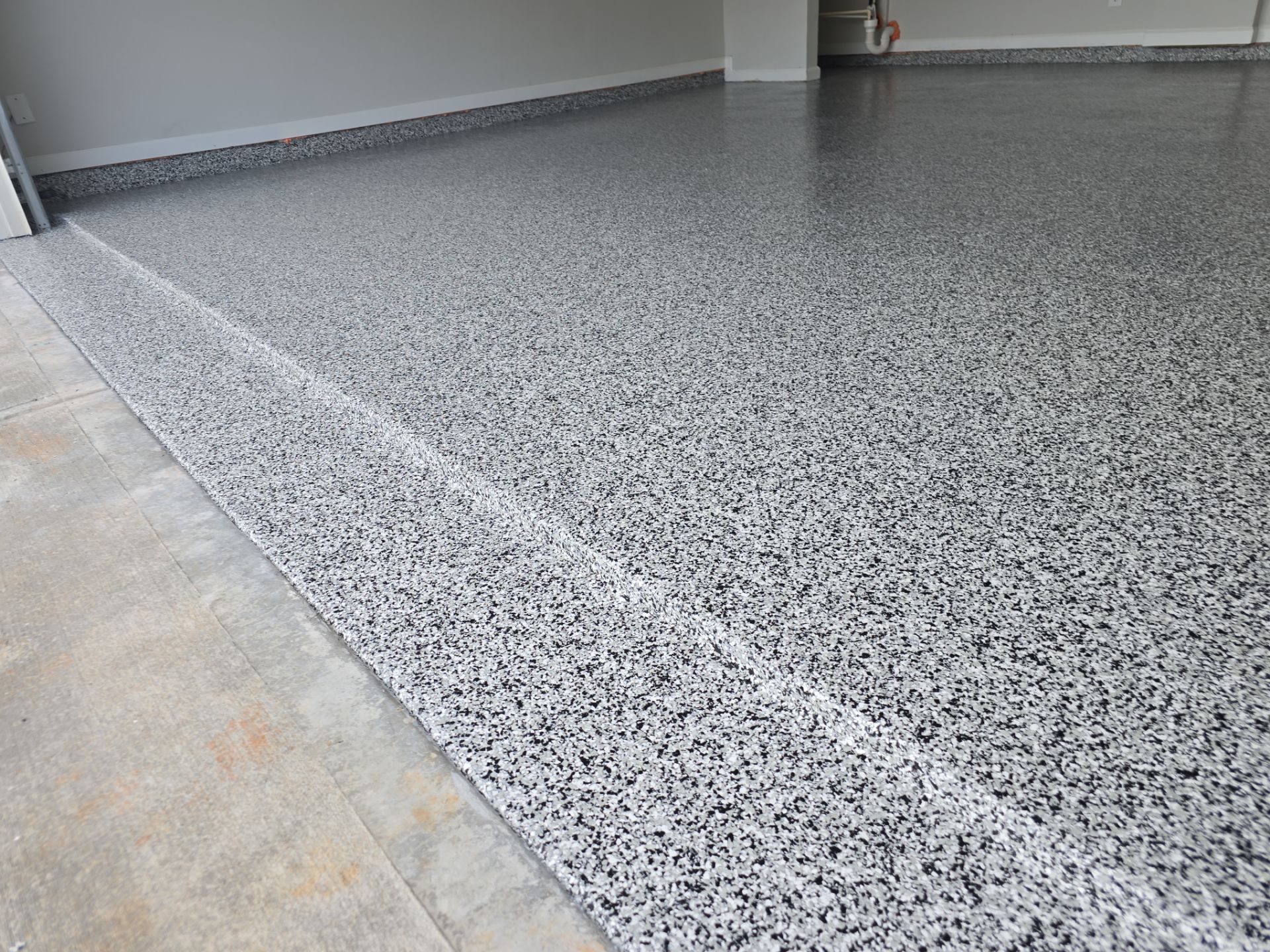 Garage floor transformation in Snellville by Opus Renovations 