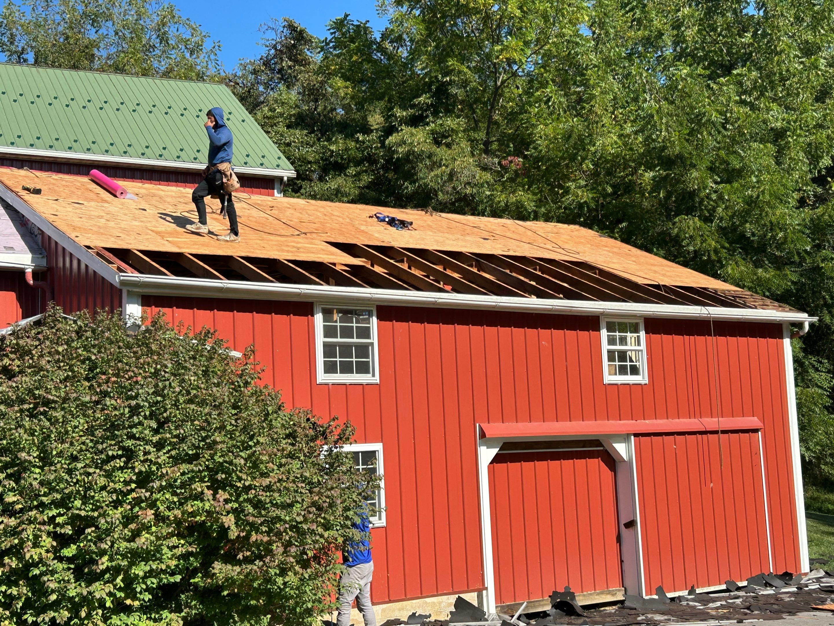 Stunning Metal Roof Transformation on a Classic Red Barn in New Freedom, PA by Bealing Roofing & Exteriors