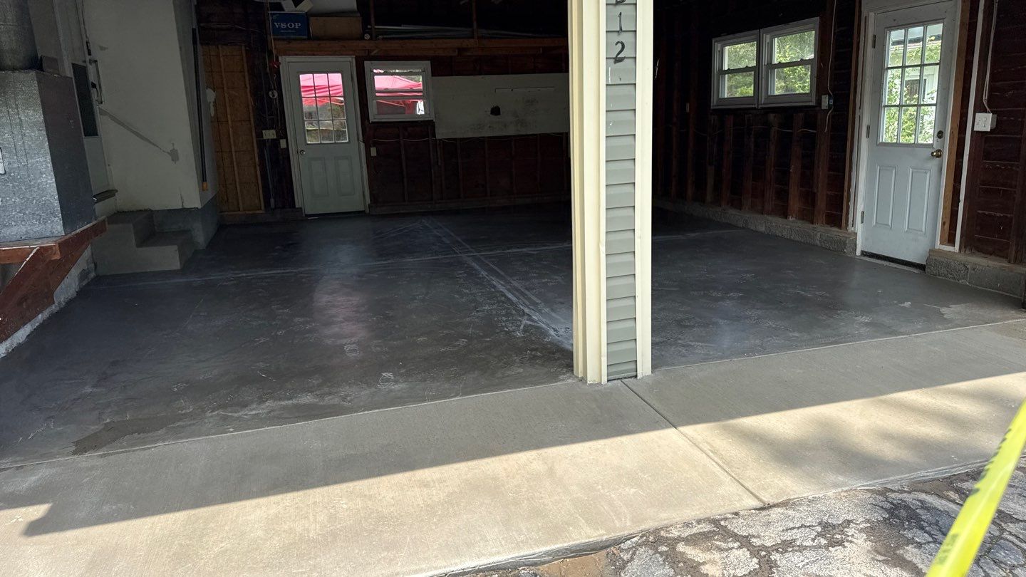 Concrete garage floor replacement  by NG Masonry & Construction LLC