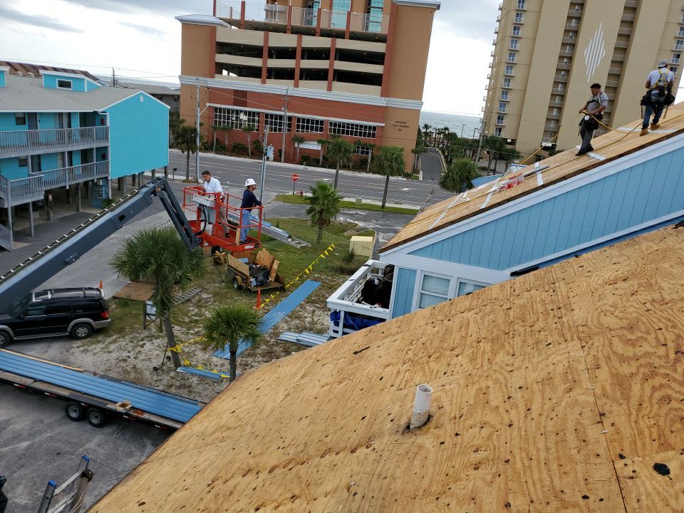 Commercial Roofing Installation using Metal roofing by American Roofing & Construction LLC
