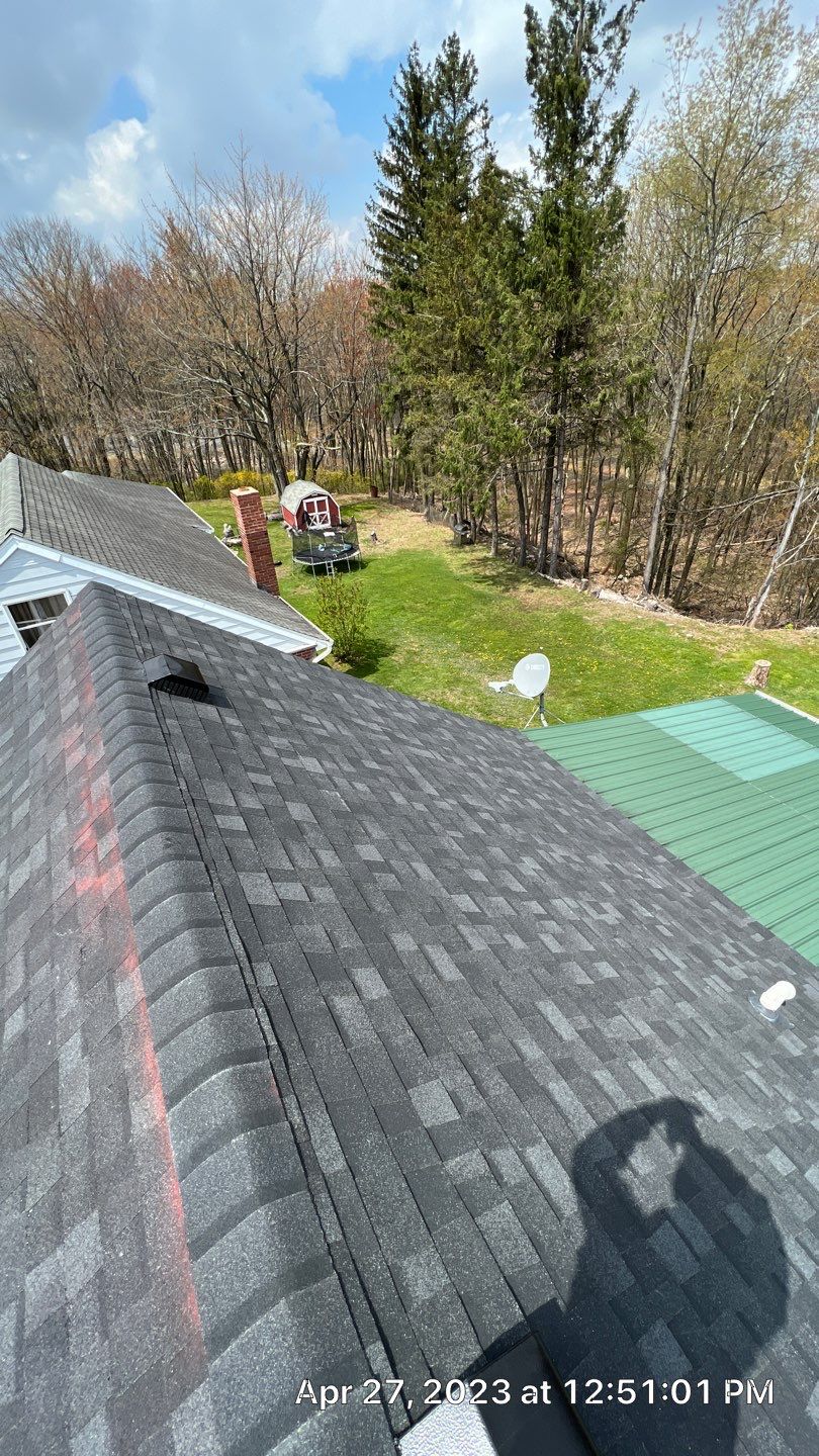 Estate Gray Shingles by Reimagine Roofing