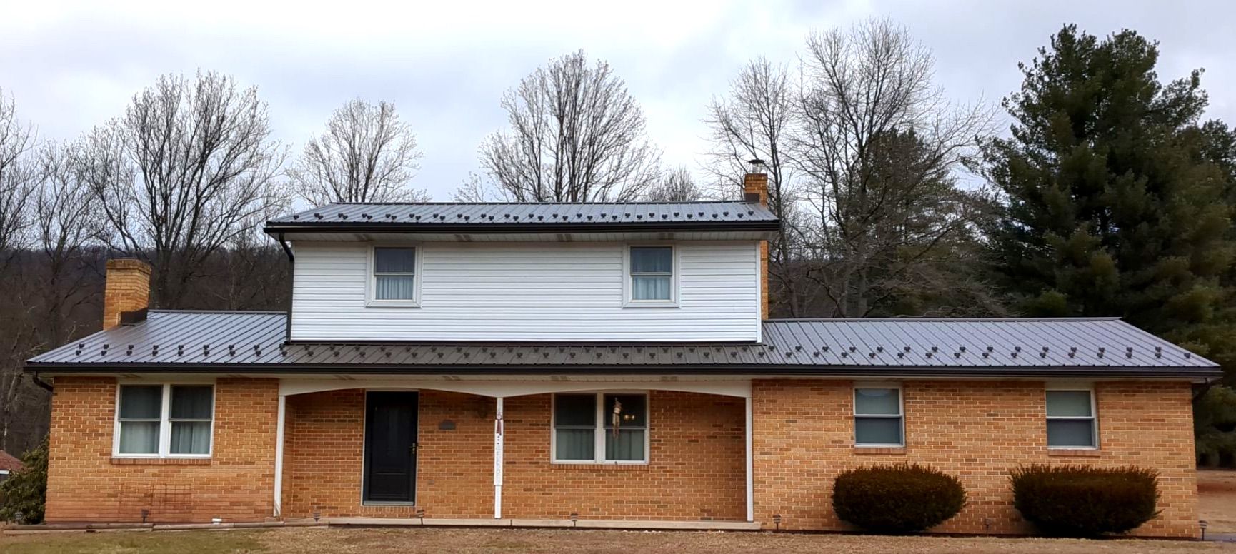 AB Martin Metal Roof Installation-Black by Esh Builders