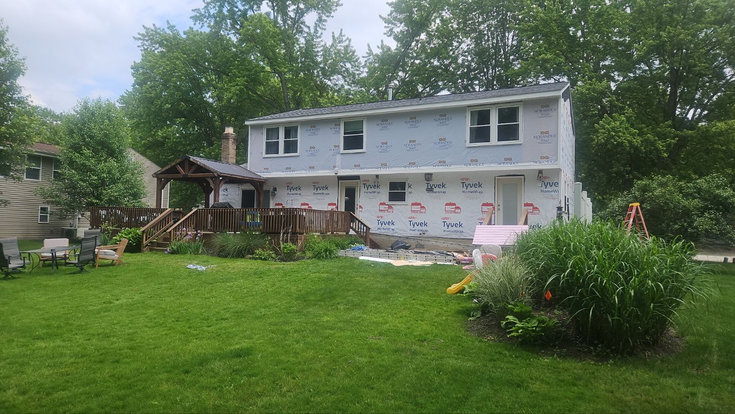 Roof, Siding, & Gutters by Absolute Roofing and Construction