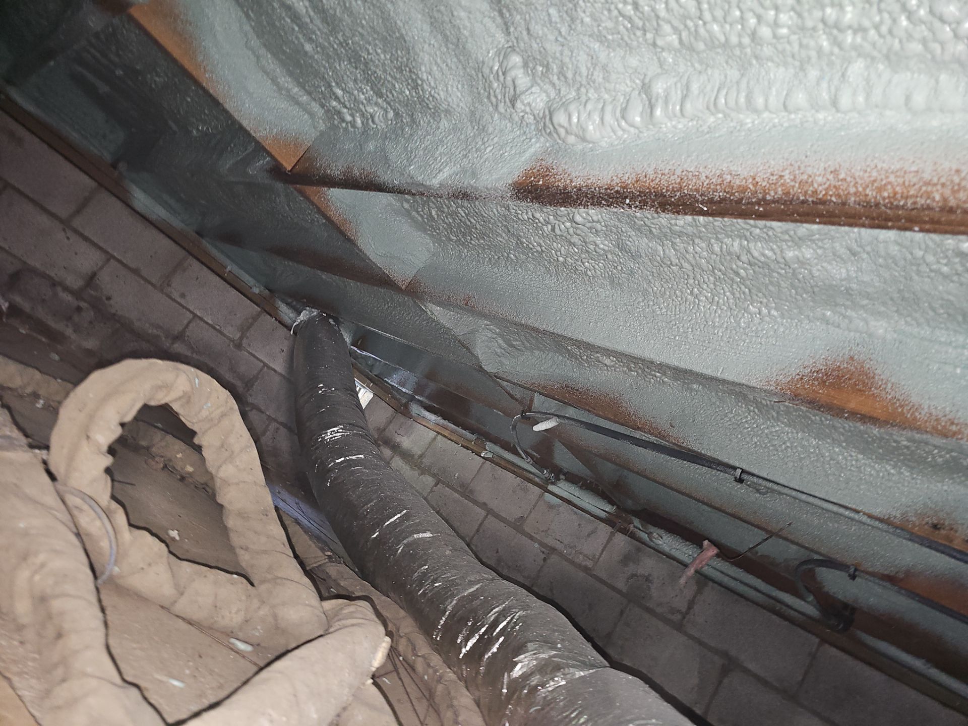 Attic Insulation using open cell spray foam by NYS Foam & Energy