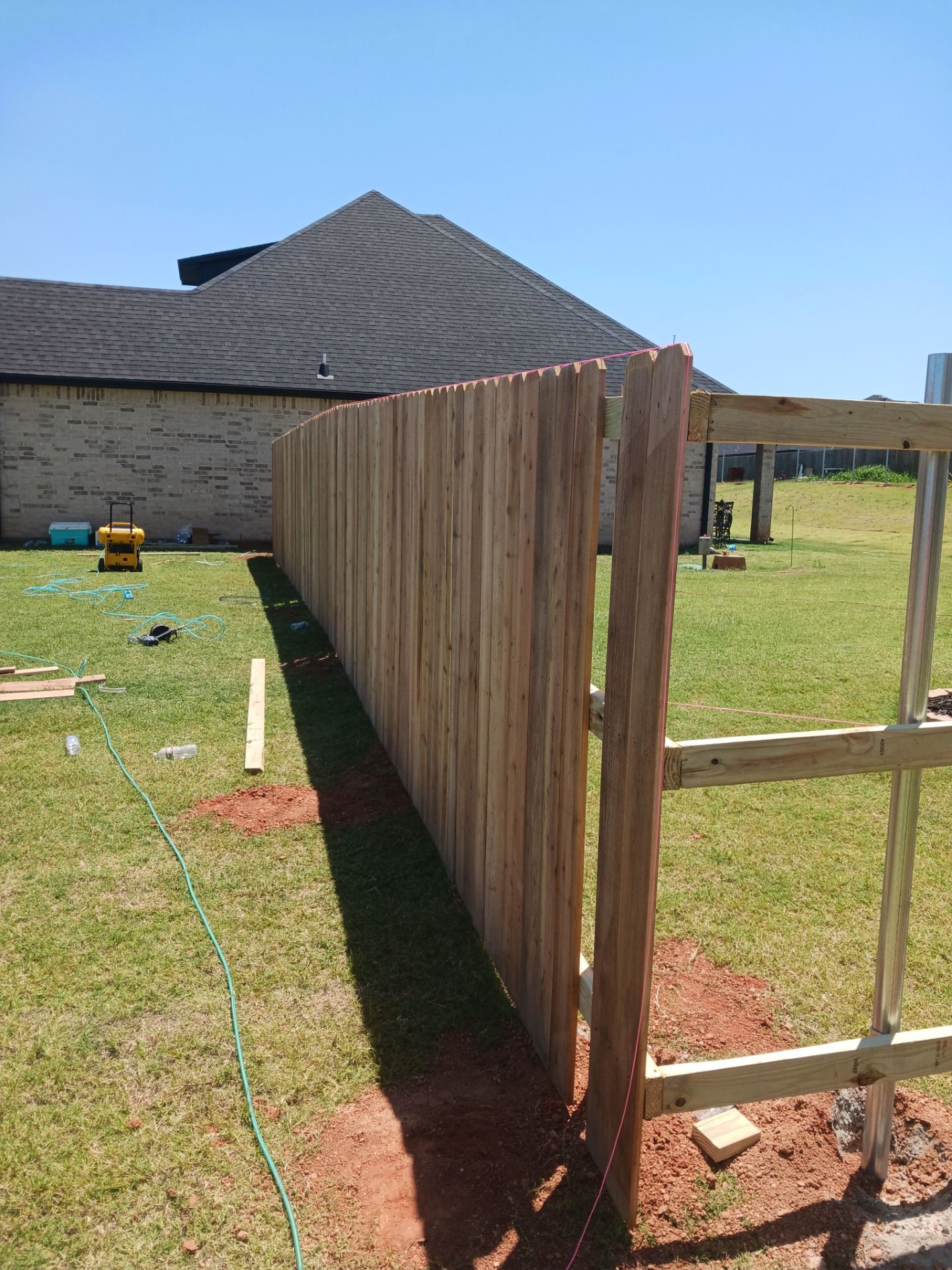 Cedar Fence using Metal Poles by Clays Services Inc