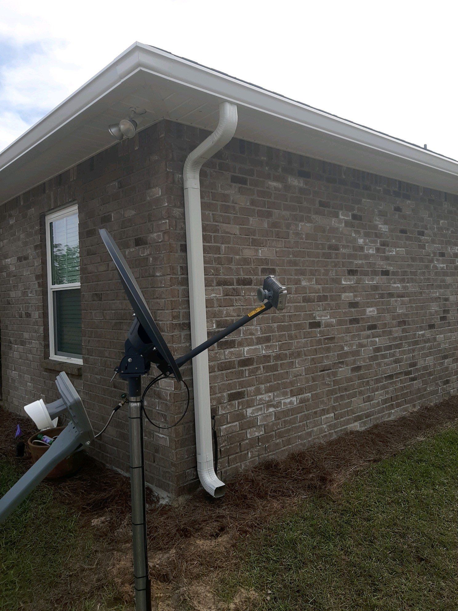 Seamless Gutter Installation Using White K-Style Gutters by Gutter Professors