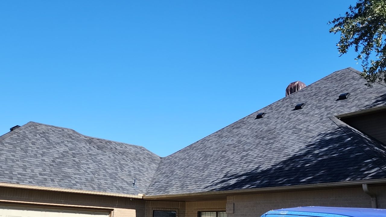 Residential Roofing Installation using Certainteed Landmark Moire Black by Galvan Roofing and Construction
