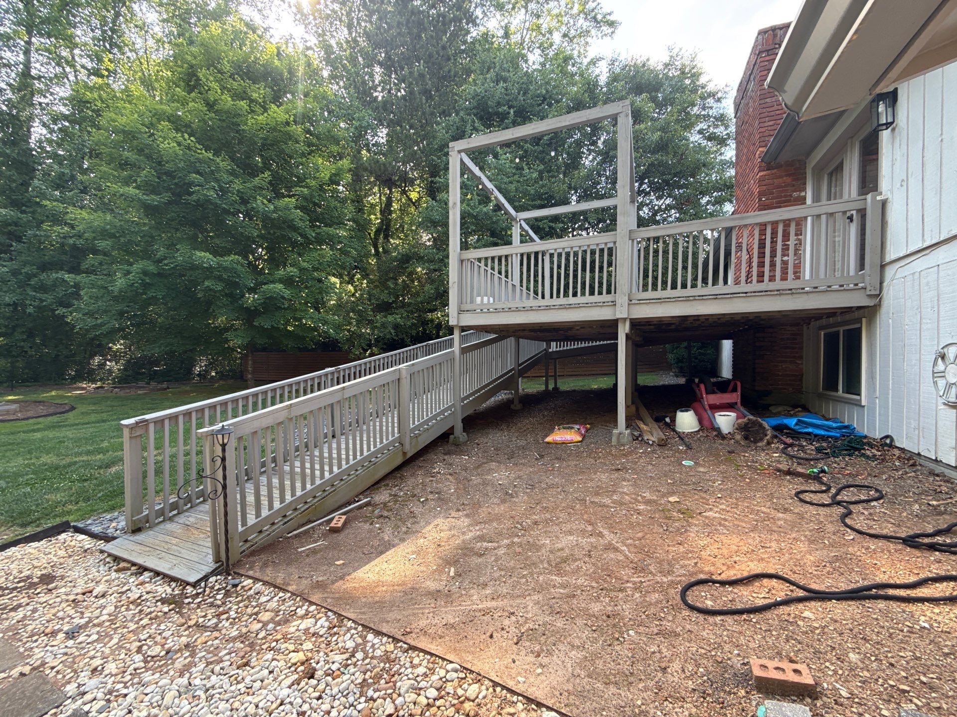 Deck and Shed Roof Style Covered Build using Trex Decking Products by Nelson Exteriors 