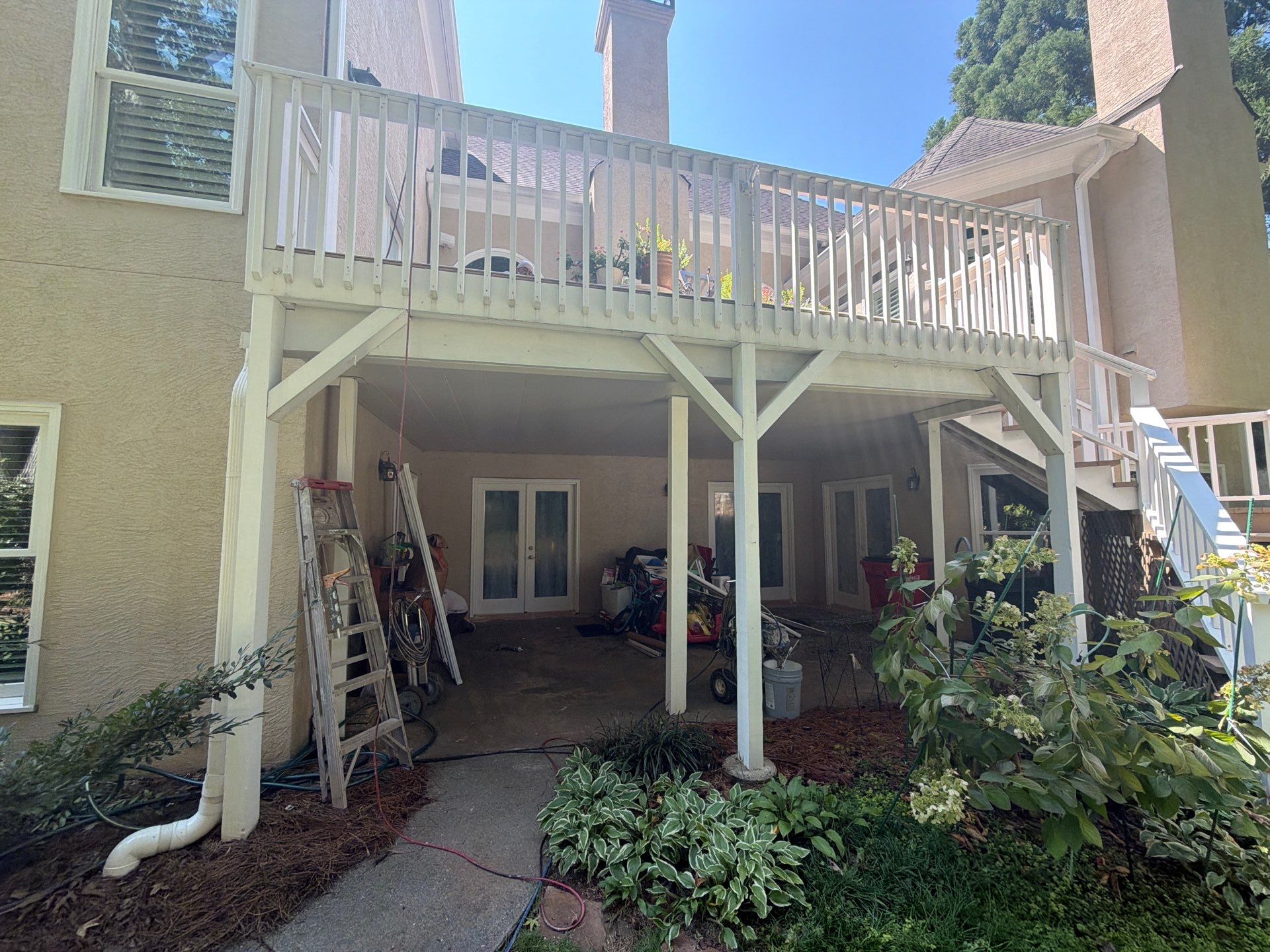 Multi-Story Stucco Home Exterior Painting and Garage Refresh in Marietta by Swift Home Renovations 