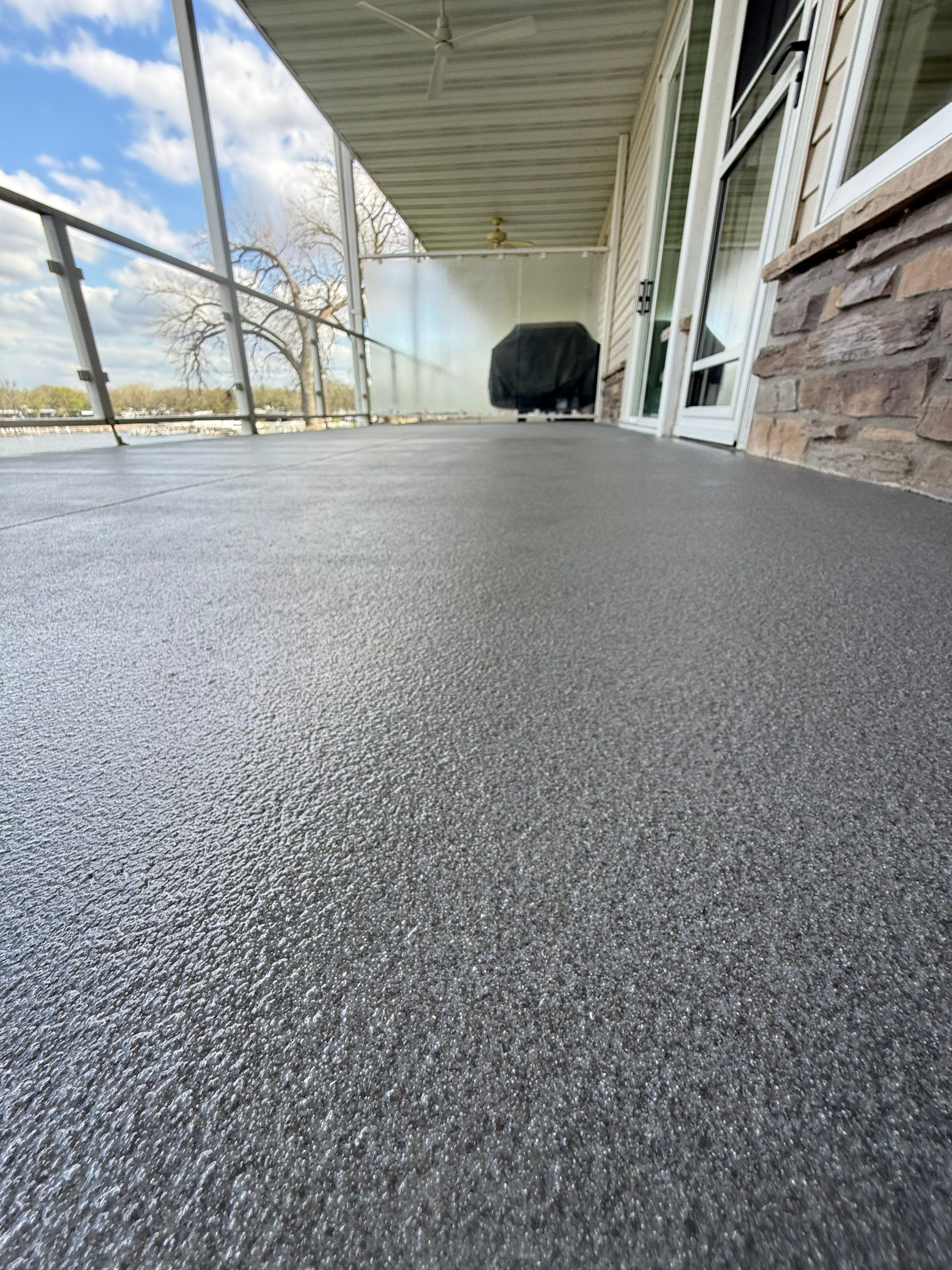 Dark Gray Slip-Resistant Concrete Coating for Arnolds Park Balcony by Select Painting, Coatings & Garage Cabinets