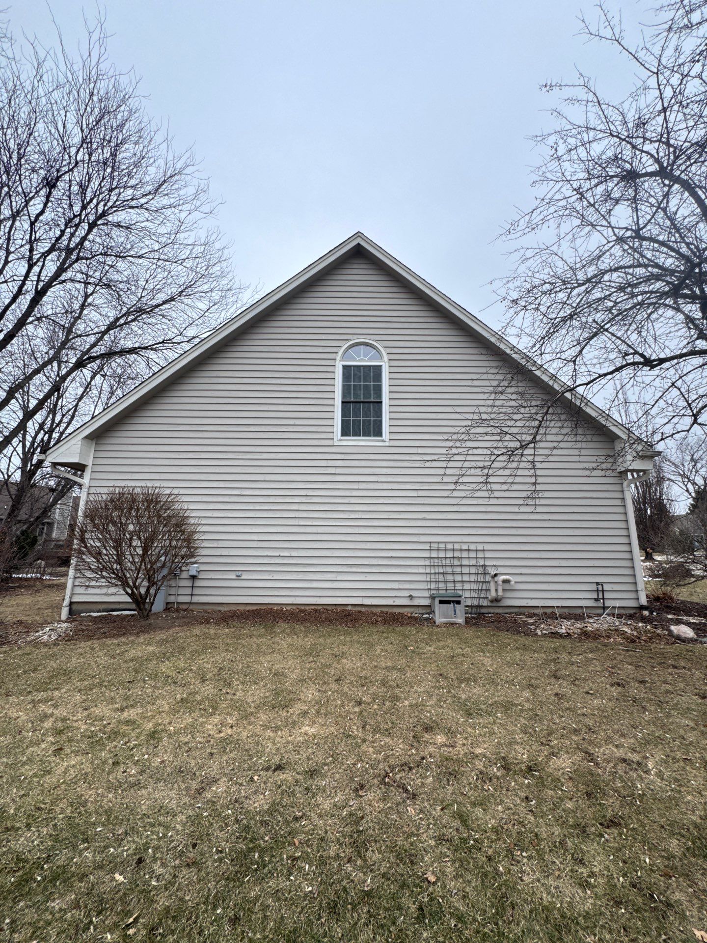 Exterior Home Staining Project in Greenfield Using Sherwin-Williams Amazing Gray by OCS Contracting Services