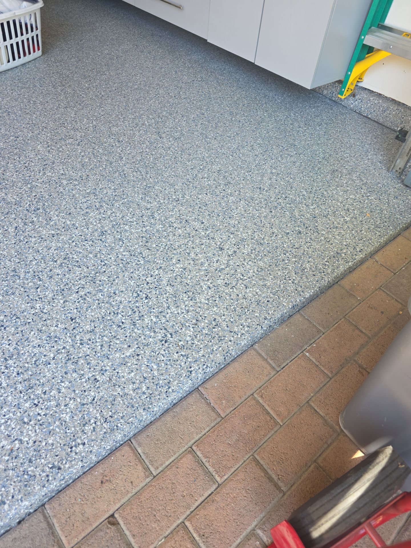 Polyurea Garage Floor Transformation with Stonewash Chips in Cambria by MGP Coatings