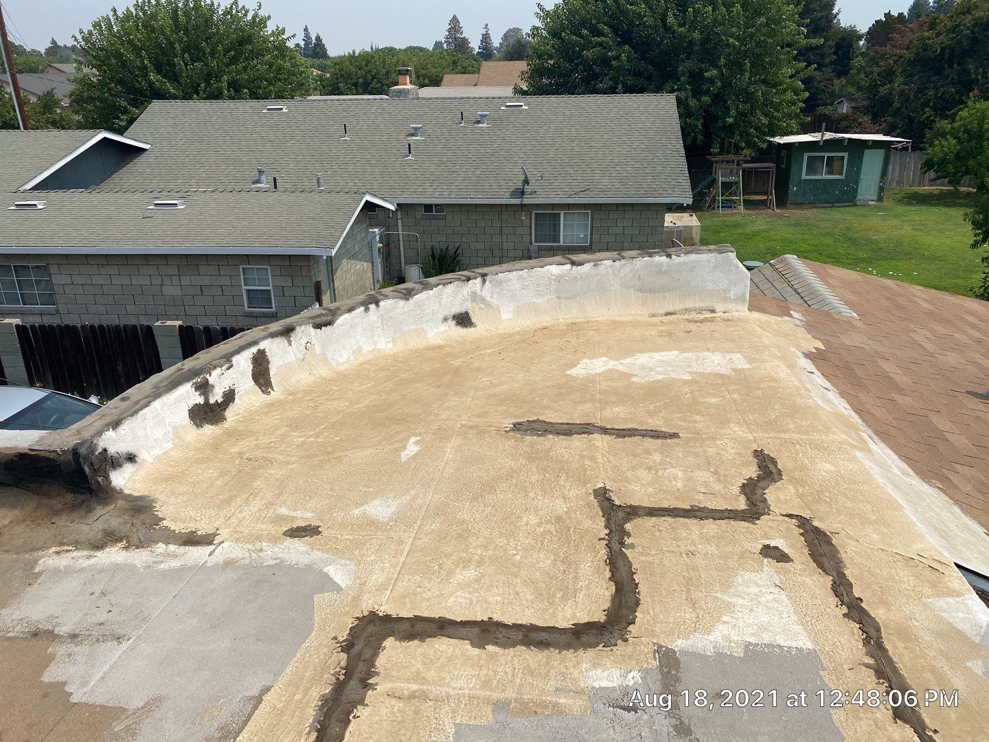 Residential Roofing Installation using Spray foam roofing insulation and General Coatings acrylic coatings by Straight Edge Roofing Inc