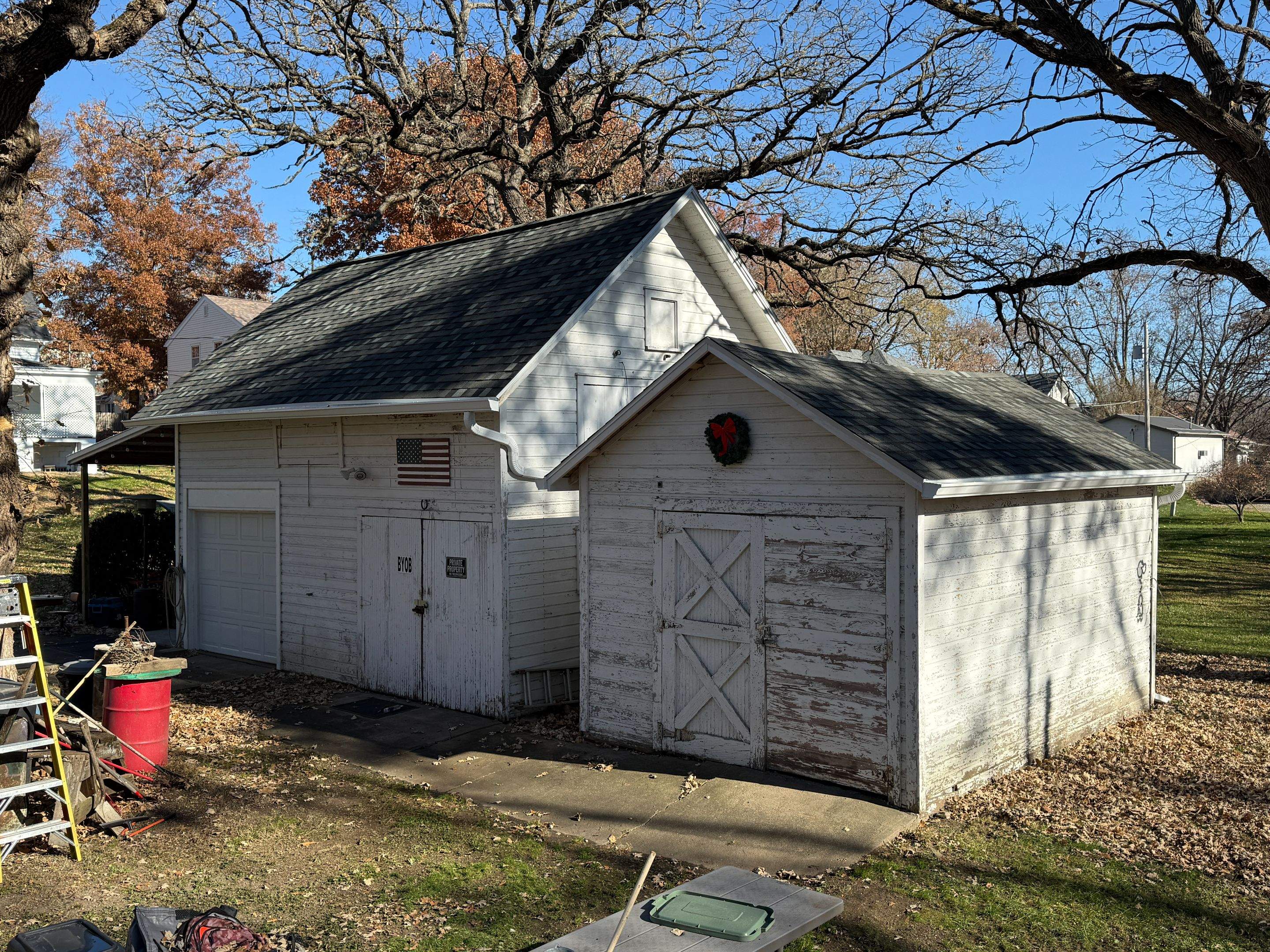 Garage Roof Replacement and Gutter Guard Installation in Red Oak by Star Home