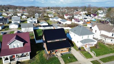 Residential Roofing Installation using Perfromance Panel Metal - Black