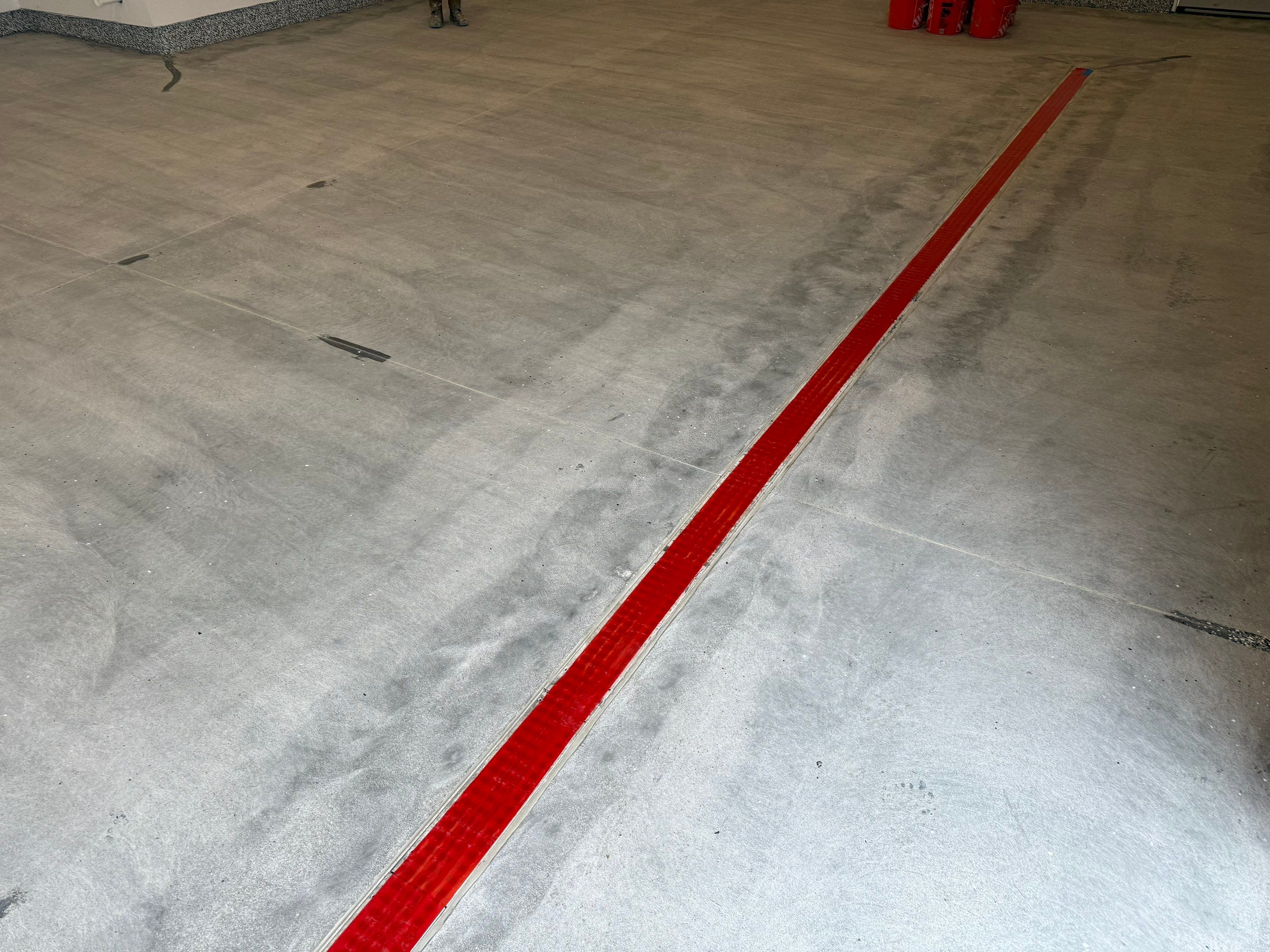 Multi-Car Garage Epoxy Floor Coating and Concrete Finishing in Sioux Falls by Select Painting, Coatings & Garage Cabinets