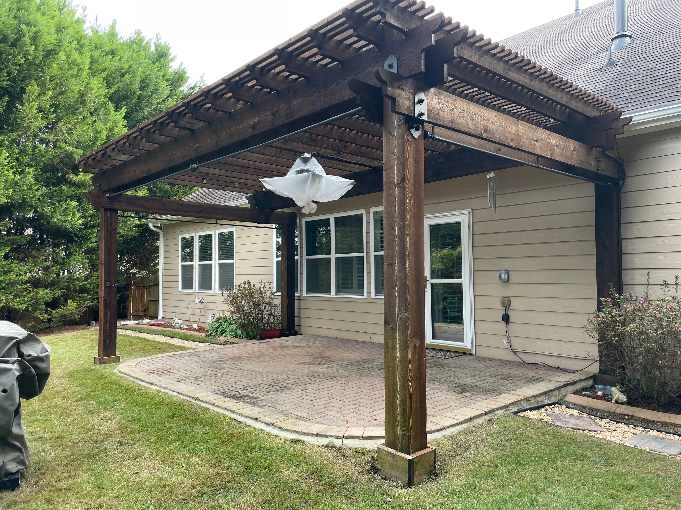 Exterior Painting and Pergola Staining for Woodstock Residence by Swift Home Renovations