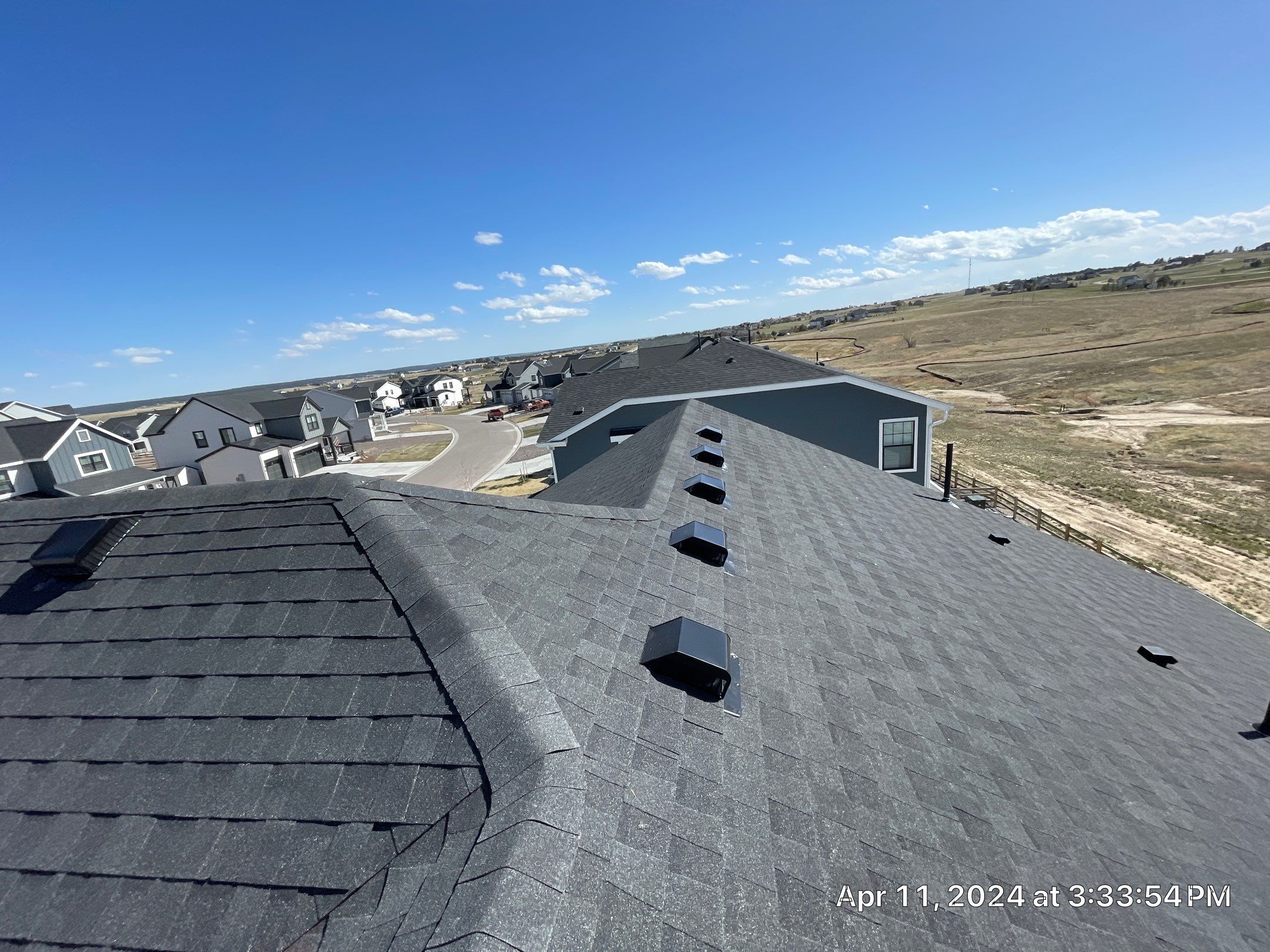 Residential Roofing Installation using Atlas Pinnacle Impact Black Shadow by Blue Peaks Roofing LLC 